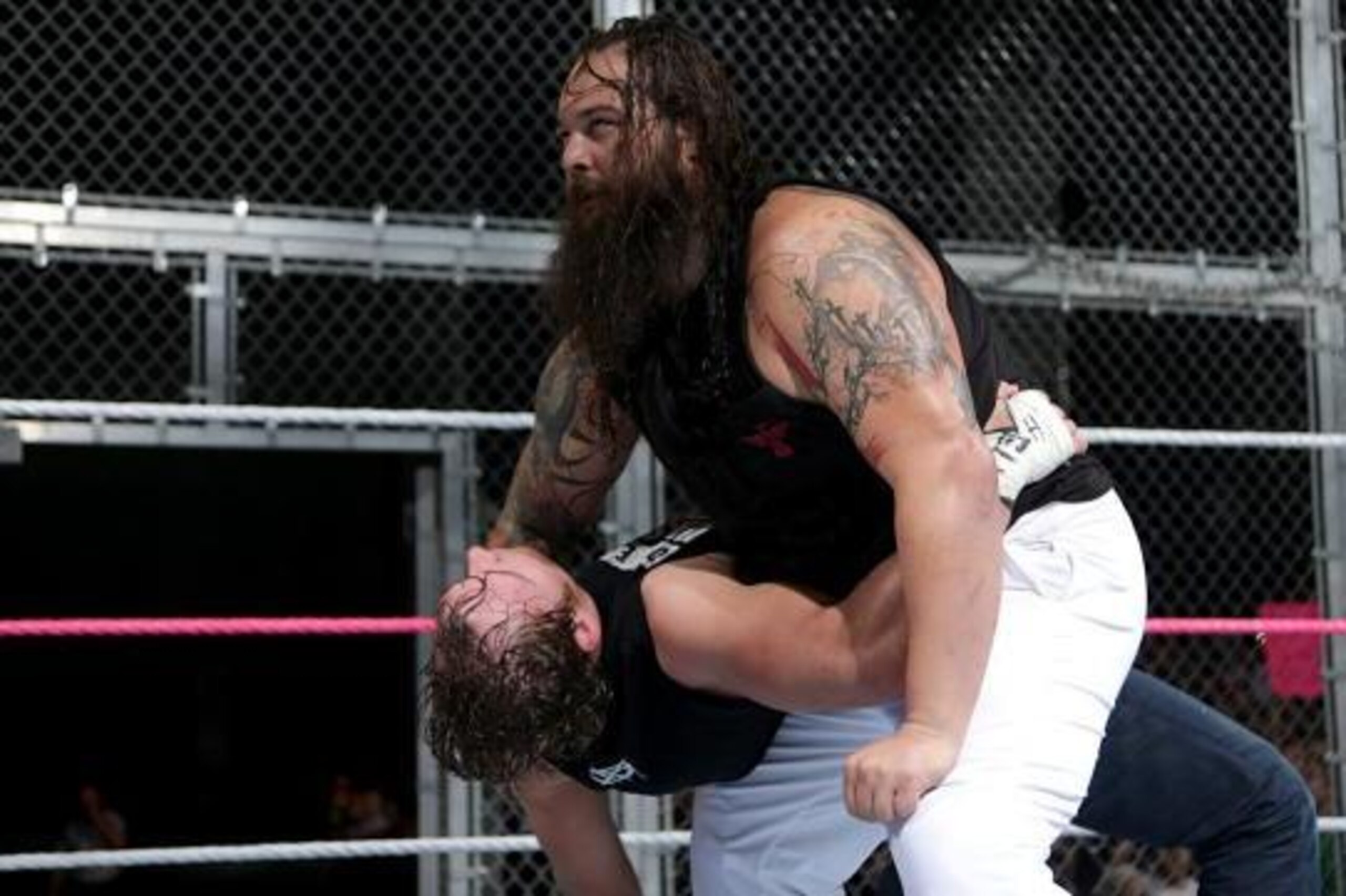Wyatt takes down Reigns like he did Ambrose, with the element of surprise.