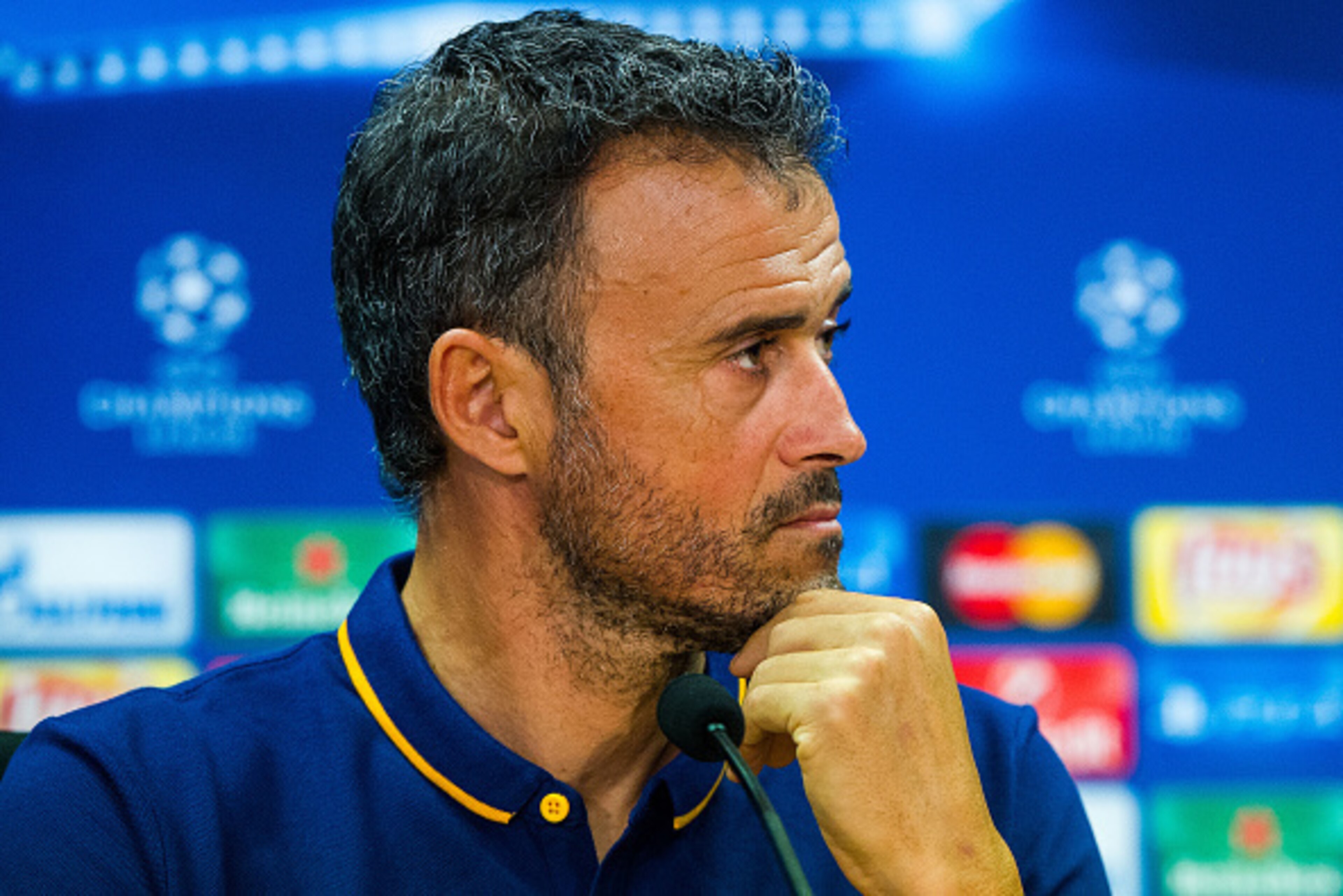 BARCELONA, SPAIN - SEPTEMBER 28: Head coach Luis Enrique of FC Barcelona looks on during a press conference ahead of a UEFA Champions League Group E match against Bayern 04 Leverkusen at Ciutat Esportiva on September 28, 2015 in Barcelona, Spain. (Photo BARCELONA, SPAIN - SEPTEMBER 28: Head coach Luis Enrique of FC Barcelona looks on during a press conference ahead of a UEFA Champions League Group E match against Bayern 04 Leverkusen at Ciutat Esportiva on September 28, 2015 in Barcelona, Spain. (Photo