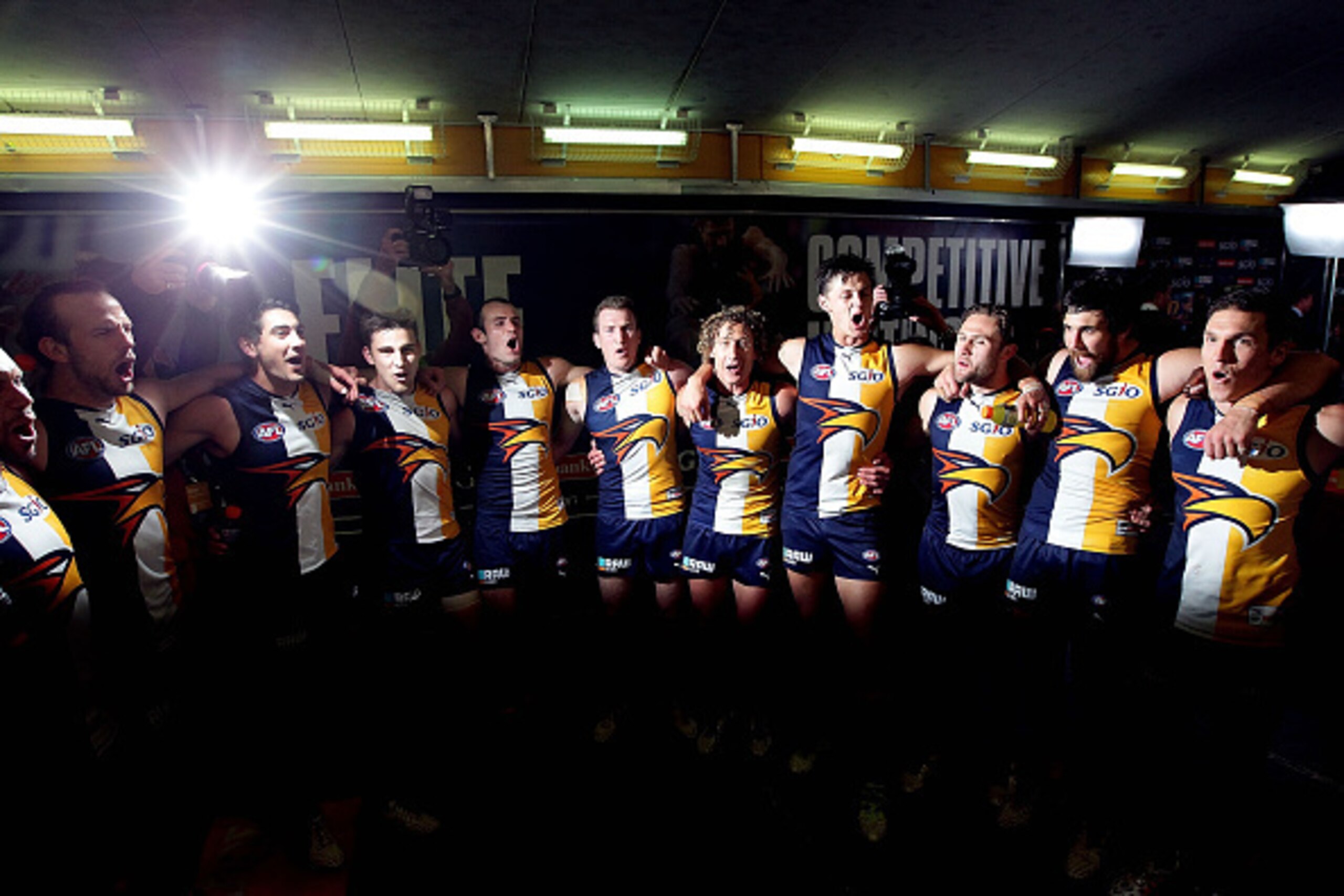 PERTH, WESTERN AUSTRALIA - SEPTEMBER 26: The Eagles sing the team song after winning the AFL Second Preliminary Final match between the West Coast Eagles and the North Melbourne Kangaroos at Domain Stadium on September 26, 2015 in Perth, Australia. (Phot PERTH, WESTERN AUSTRALIA - SEPTEMBER 26: The Eagles sing the team song after winning the AFL Second Preliminary Final match between the West Coast Eagles and the North Melbourne Kangaroos at Domain Stadium on September 26, 2015 in Perth, Australia. (Phot