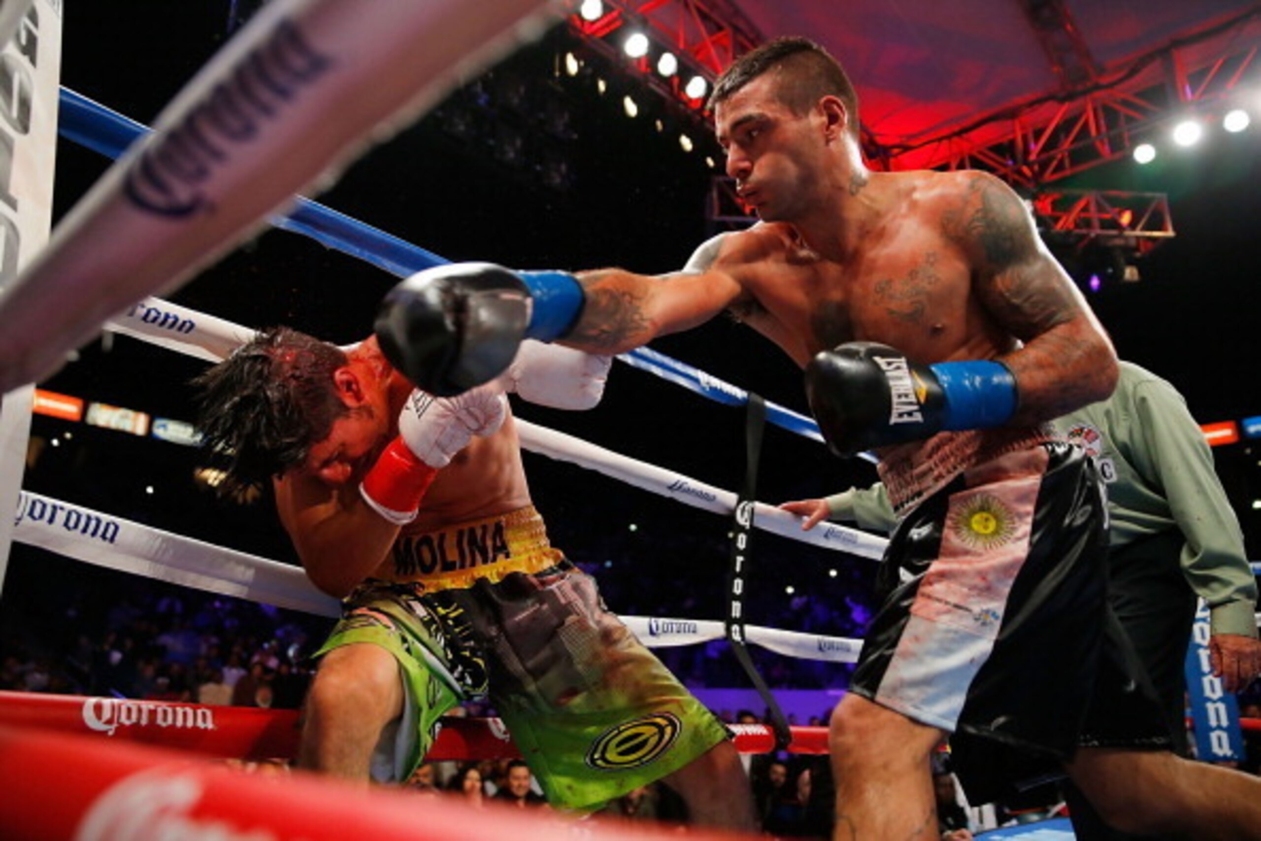 LOS ANGELES, CA - APRIL 26:  Lucas Matthysse delivers a knockout punch to John Molina in the 11'th round during their fight at StubHub Center on April 26, 2014 in Los Angeles, California.  (Photo by Joe Scarnici/Getty Images)