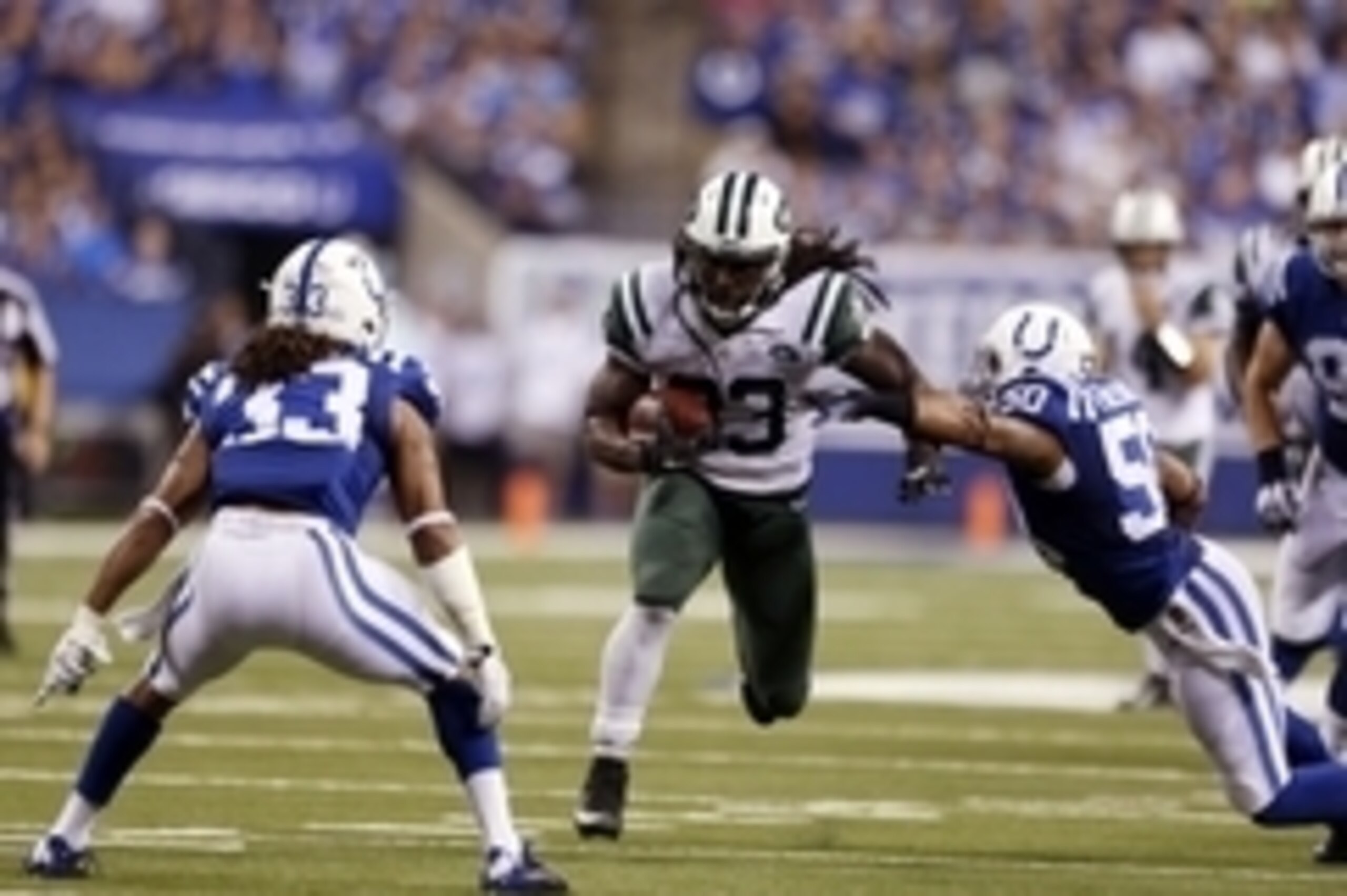 Sep 21, 2015; Indianapolis, IN, USA; New York Jets running back Chris Ivory (33) runs with the ball against the Indianapolis Colts at Lucas Oil Stadium. New York Jets defeat the Indianapolis Colts 20-7. Mandatory Credit: Brian Spurlock-USA TODAY Sports
