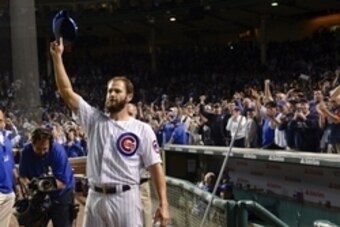 Sep 22, 2015; Chicago, IL, USA; Chicago Cubs starting pitcher Jake Arrieta (49) waves to the crowd after beating the Milwaukee Brewers 4-0 at Wrigley Field. Mandatory Credit: Matt Marton-USA TODAY Sports