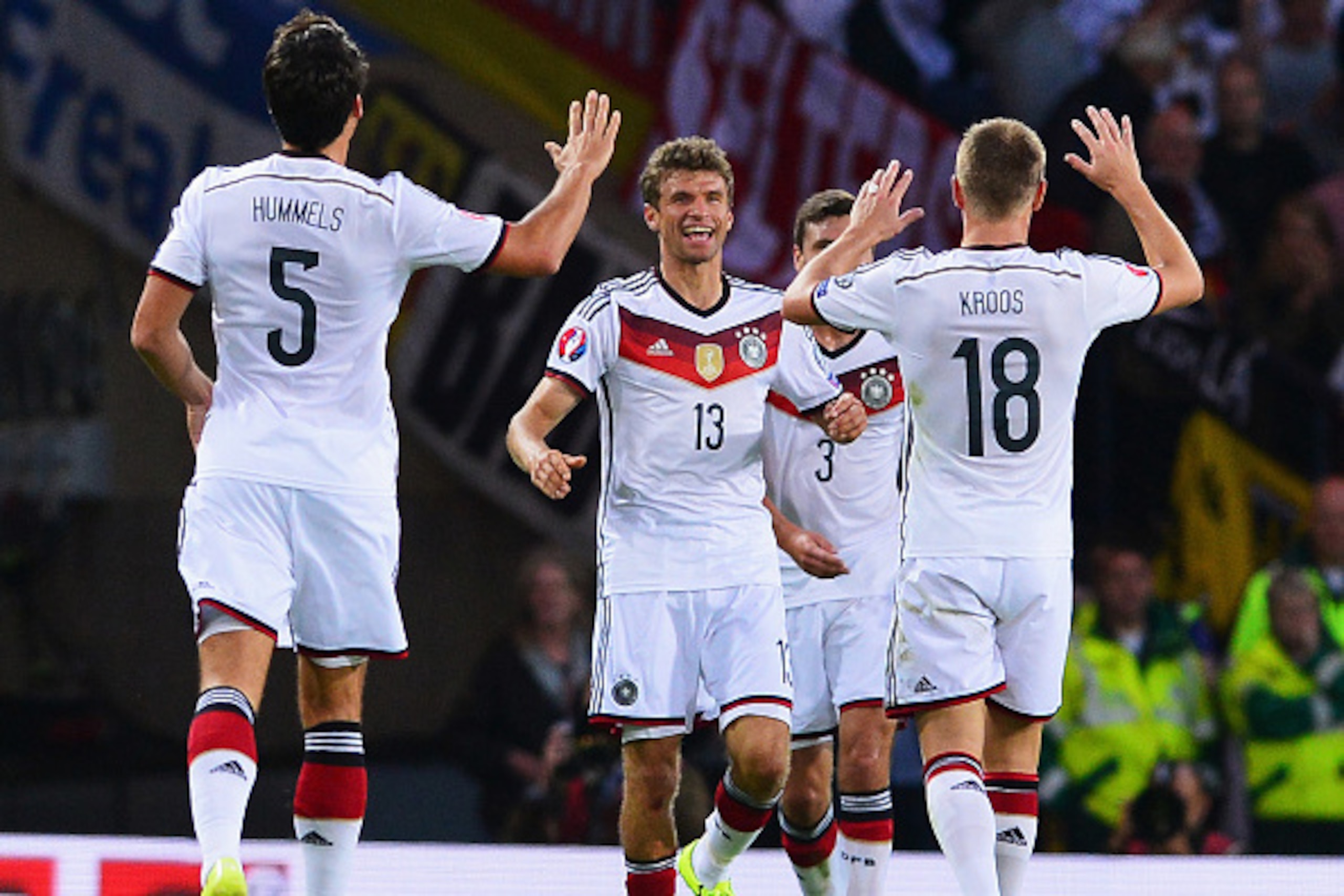 GLASGOW, SCOTLAND - SEPTEMBER 07:  Thomas Mueller of Germany celebrates scoring his teams opening goal with team mates during the UEFA EURO 2016 Qualifier Group D match between Scotland and Germany at Hampden Park on September 7, 2015 in Glasgow, Scotland
