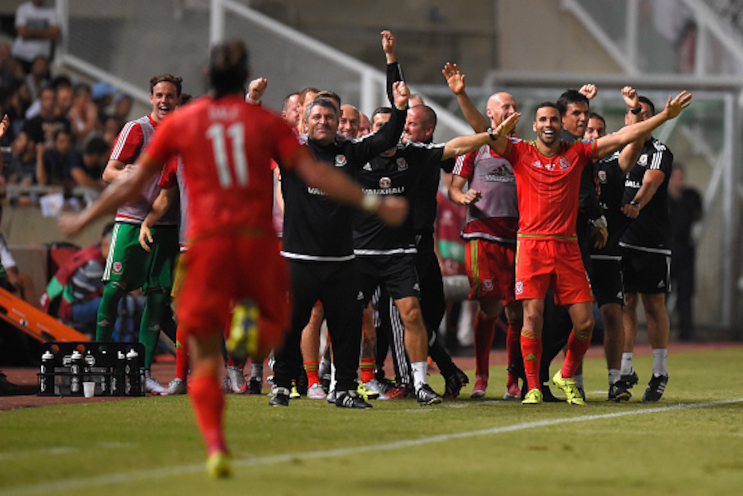 NICOSIA, CYPRUS - SEPTEMBER 03:  Wales striker Gareth Bale runs over to the bench to celebrate after scoring the opening goal during  the UEFA EURO 2016 Qualifier between Cyprus and Wales at GPS Stadium on September 3, 2015 in Nicosia, Cyprus.  (Photo by 