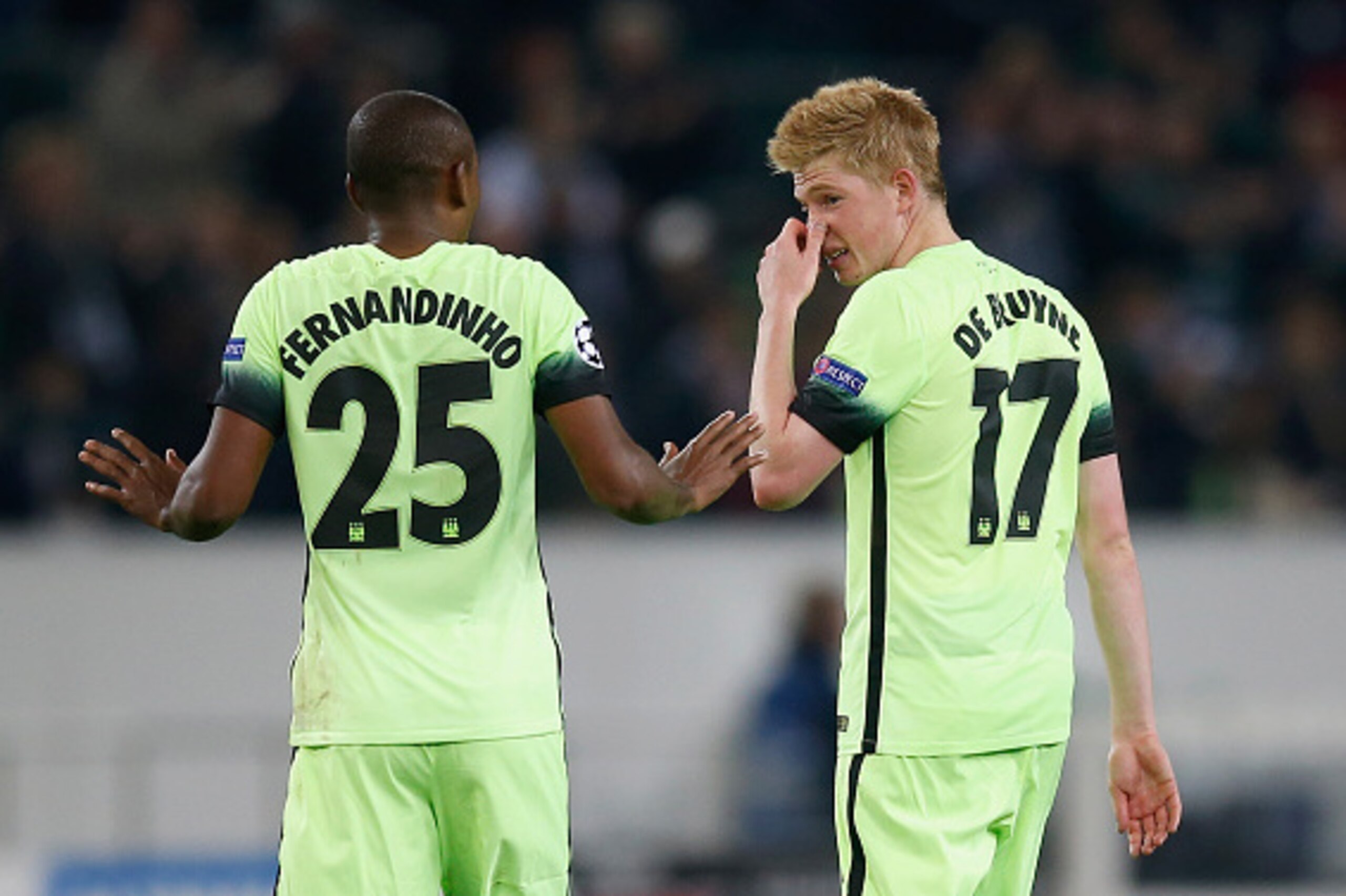 MOENCHENGLADBACH, GERMANY - SEPTEMBER 30:  Kevin De Bruyne (R) of Manchester City and team mate Fernandinho react after the UEFA Champions League Group D match between VfL Borussia Monchengladbach and Manchester City at the Borussia Park on September 30, 