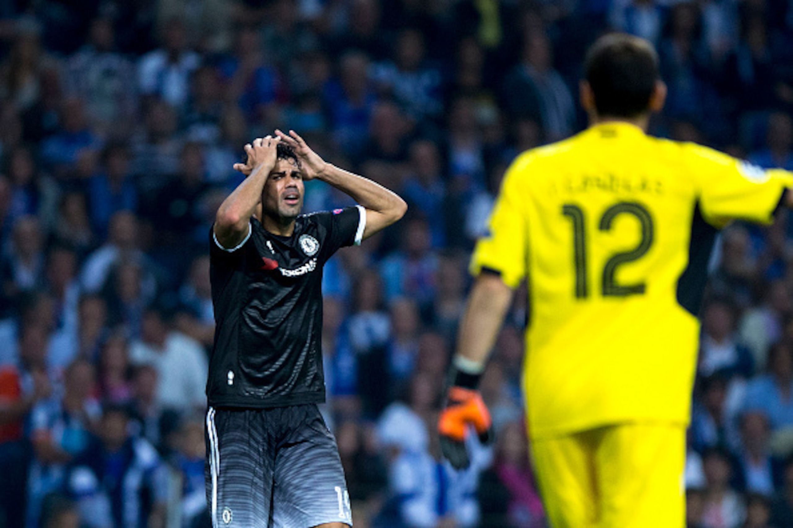 PORTO, PORTUGAL - SEPTEMBER 29:  Diego Costa (L) of Chelsea FC reacts to the referee behind goalkeeper Iker Casillas (R) of FC Porto during the UEFA Champions League Group G match between FC Porto and Chelsea FC  at Estadio do Dragao on September 29, 2015