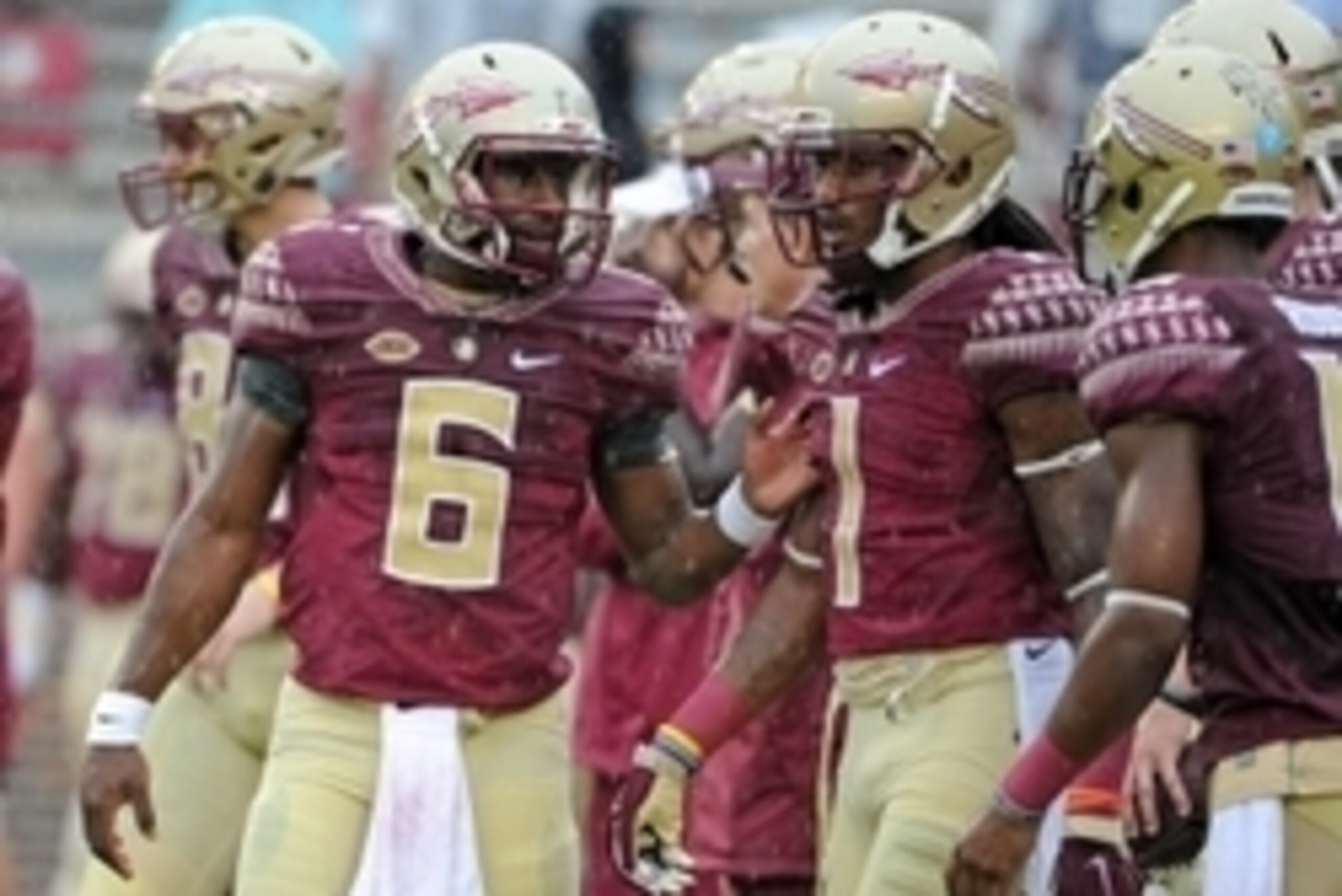 Sep 12, 2015; Tallahassee, FL, USA; Florida State Seminoles quarterback Everett Golson (6) chats with wide receiver Ermon Lane (1) before the game against the South Florida Bulls at Doak Campbell Stadium. Mandatory Credit: Melina Vastola-USA TODAY Sports