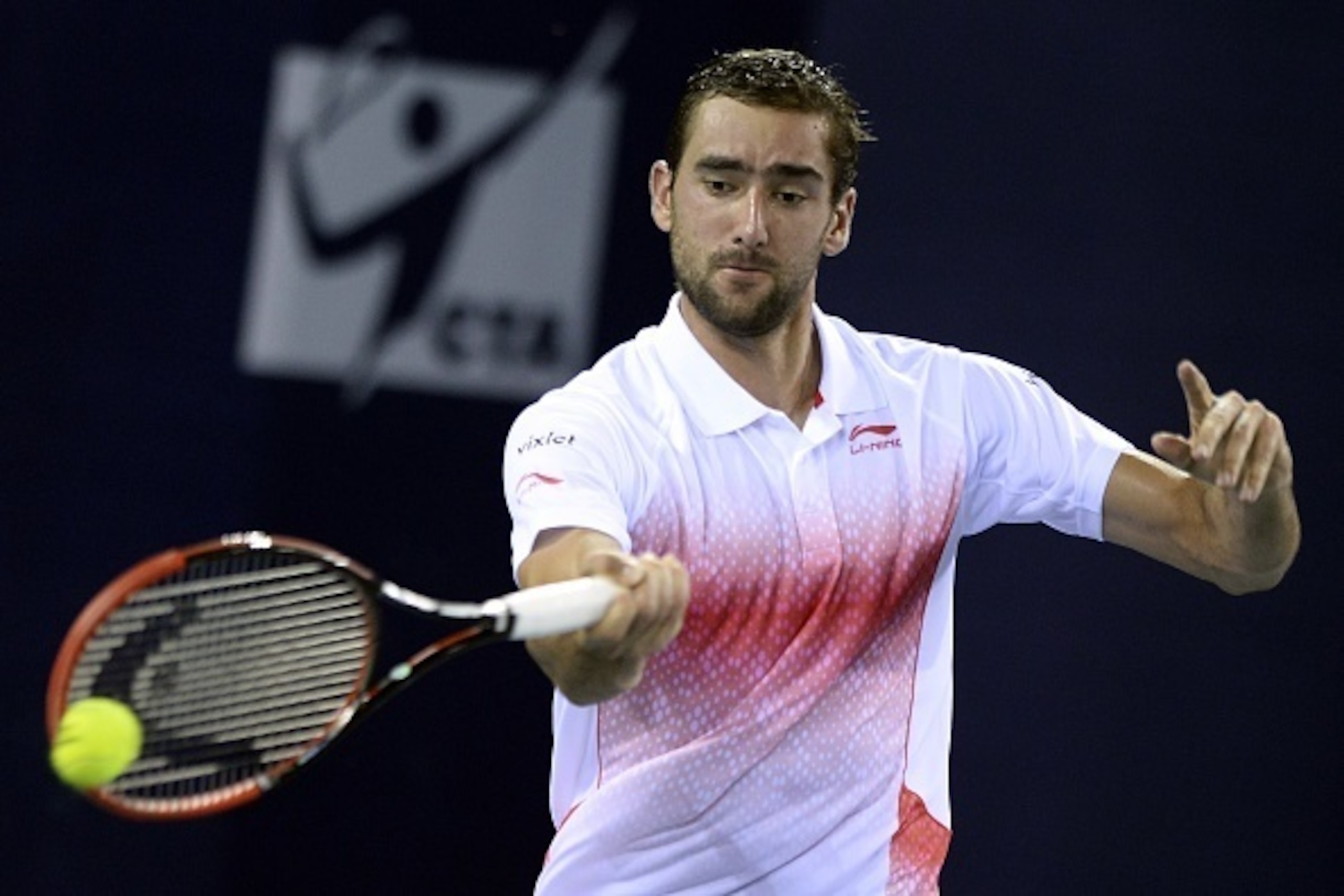 Marin Cilic of Croatia returns a shot against John Millman of Australia during the quarterfinal match at the Shenzhen Open tennis championship in Shenzhen, southern China's Guangdong province on October 1, 2015.                                   CHINA OUT