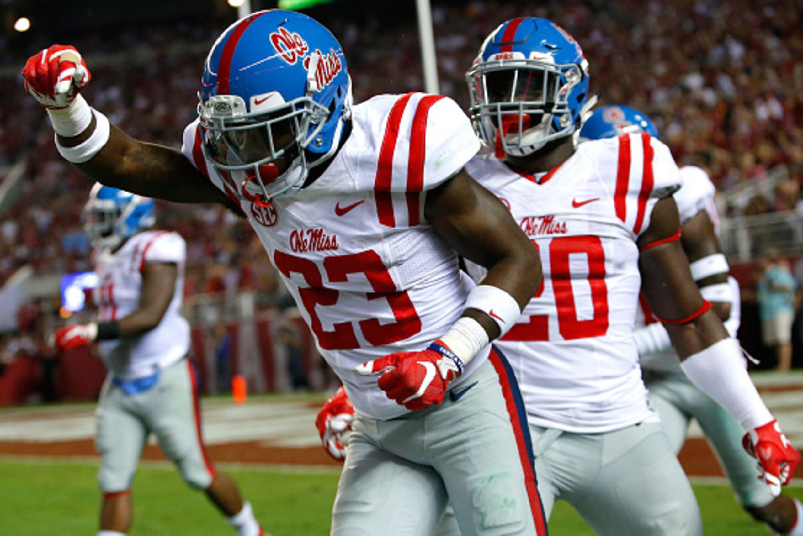 TUSCALOOSA, AL - SEPTEMBER 19: Carlos Davis #23 of the Mississippi Rebels reacts with Christian Russell #20 after recovering a fumbled kickoff return by the Alabama Crimson Tide at Bryant-Denny Stadium on September 19, 2015 in Tuscaloosa, Alabama. (Phot TUSCALOOSA, AL - SEPTEMBER 19: Carlos Davis #23 of the Mississippi Rebels reacts with Christian Russell #20 after recovering a fumbled kickoff return by the Alabama Crimson Tide at Bryant-Denny Stadium on September 19, 2015 in Tuscaloosa, Alabama. (Phot