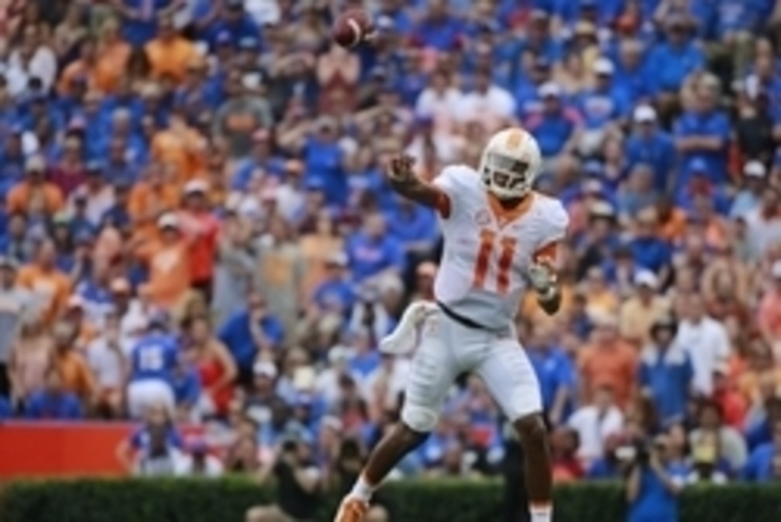Sep 26, 2015; Gainesville, FL, USA;  Tennessee Volunteers quarterback Joshua Dobbs (11) throws the ball against the Florida Gators during the first half at Ben Hill Griffin Stadium. Mandatory Credit: Kim Klement-USA TODAY Sports