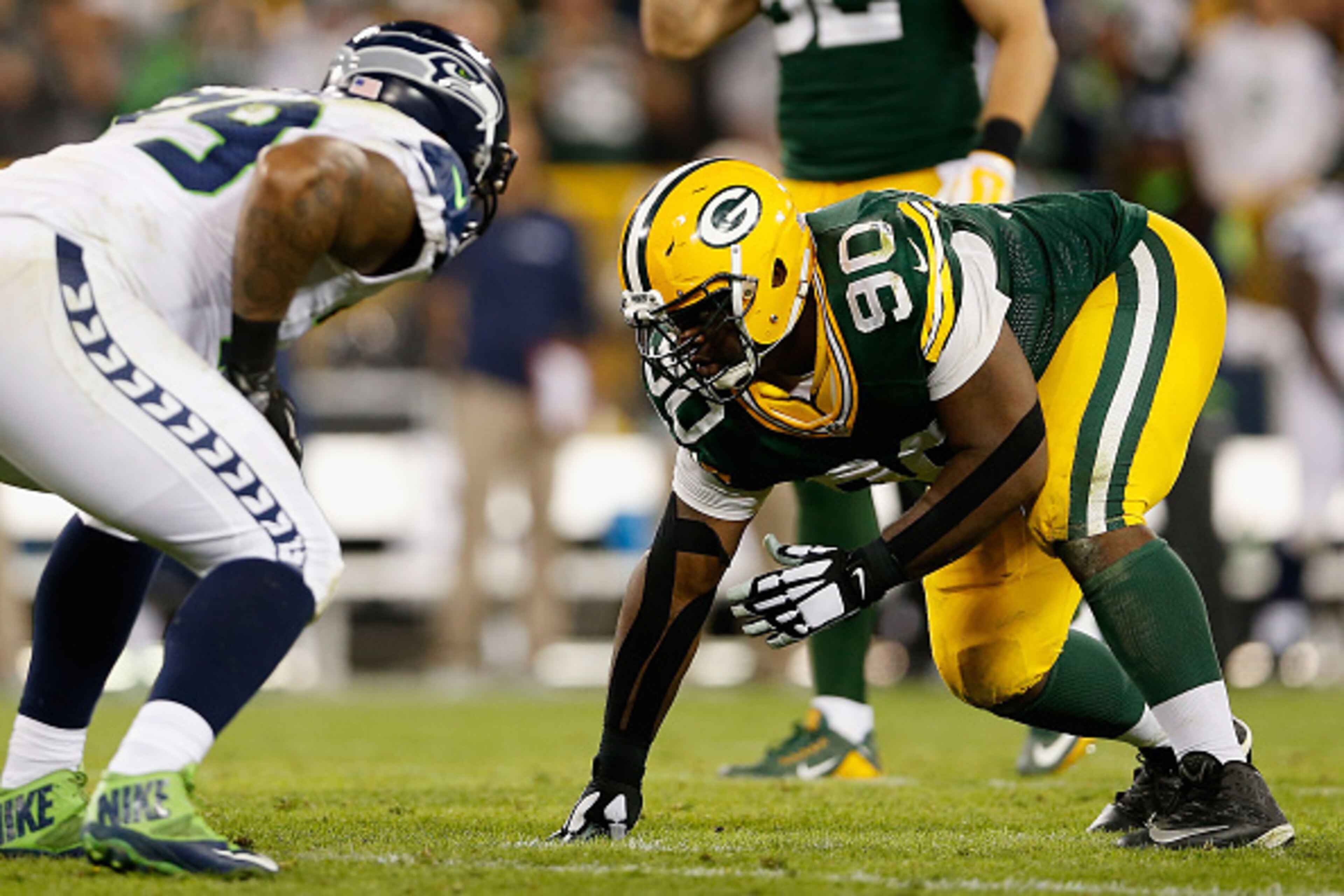 GREEN BAY, WI - SEPTEMBER 20:  Nose tackle B.J. Raji #90 of the Green Bay Packers in action during the NFL game against the Seattle Seahawks at Lambeau Field on September 20, 2015 in Green Bay, Wisconsin.  The Packers defeated the Seahawks 27-17.  (Photo
