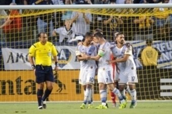 September 27, 2015; Carson, CA, USA; Los Angeles Galaxy forward Robbie Keane (7) celebrates his goal scored against FC Dallas with midfielder/forward Giovani Dos Santos (10) during the first half at StubHub Center. Mandatory Credit: Gary A. Vasquez-USA TO September 27, 2015; Carson, CA, USA; Los Angeles Galaxy forward Robbie Keane (7) celebrates his goal scored against FC Dallas with midfielder/forward Giovani Dos Santos (10) during the first half at StubHub Center. Mandatory Credit: Gary A. Vasquez-USA TO