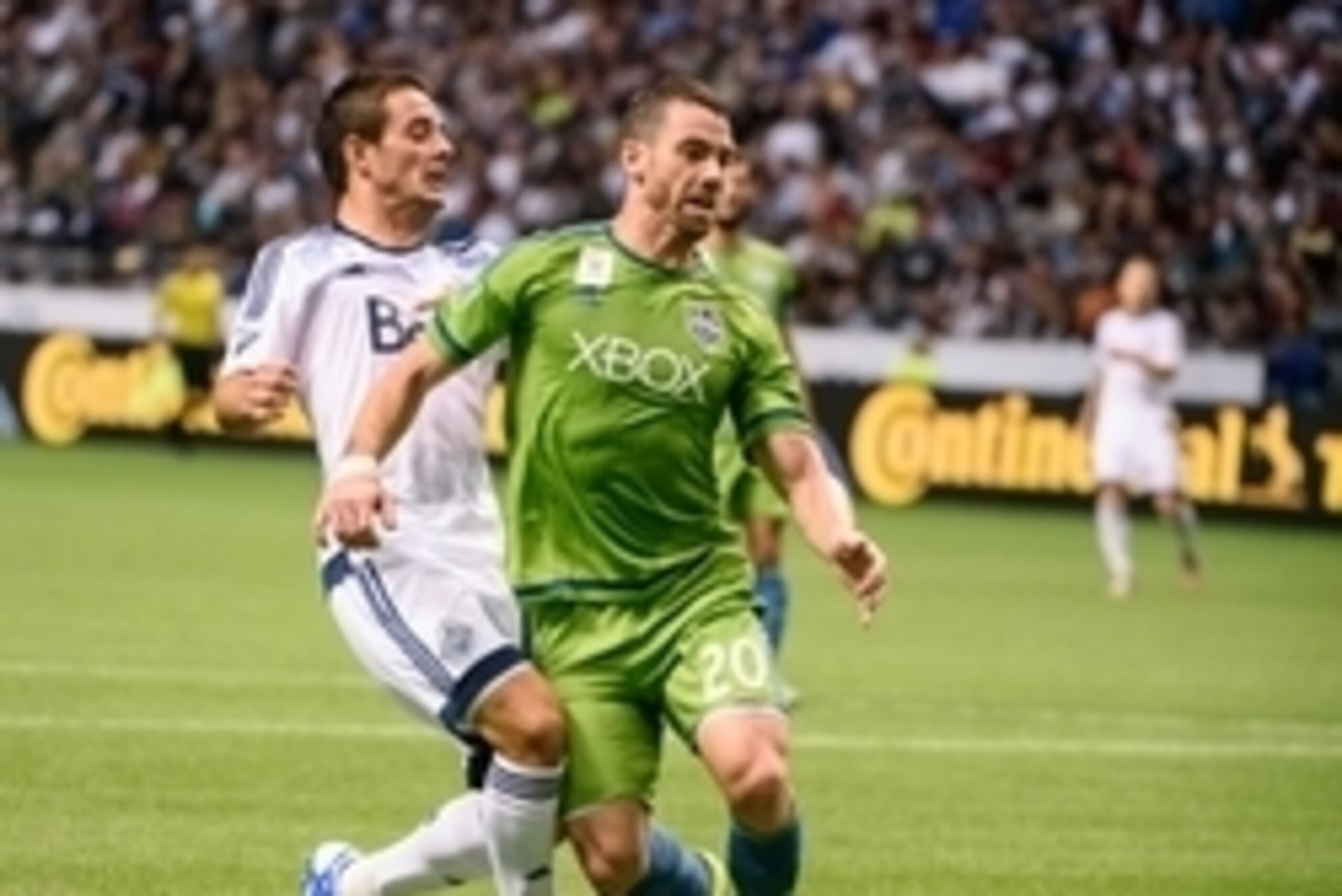 Sep 19, 2015; Vancouver, British Columbia, CAN; Vancouver Whitecaps forward Octavio Rivero (29) battles for the ball against Seattle Sounders defender Zach Scott (20) during the second half at BC Place. The Seattle Sounders won 3-0. Mandatory Credit: Anne Sep 19, 2015; Vancouver, British Columbia, CAN; Vancouver Whitecaps forward Octavio Rivero (29) battles for the ball against Seattle Sounders defender Zach Scott (20) during the second half at BC Place. The Seattle Sounders won 3-0. Mandatory Credit: Anne