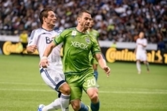 Sep 19, 2015; Vancouver, British Columbia, CAN; Vancouver Whitecaps forward Octavio Rivero (29) battles for the ball against Seattle Sounders defender Zach Scott (20) during the second half at BC Place. The Seattle Sounders won 3-0. Mandatory Credit: Anne Sep 19, 2015; Vancouver, British Columbia, CAN; Vancouver Whitecaps forward Octavio Rivero (29) battles for the ball against Seattle Sounders defender Zach Scott (20) during the second half at BC Place. The Seattle Sounders won 3-0. Mandatory Credit: Anne