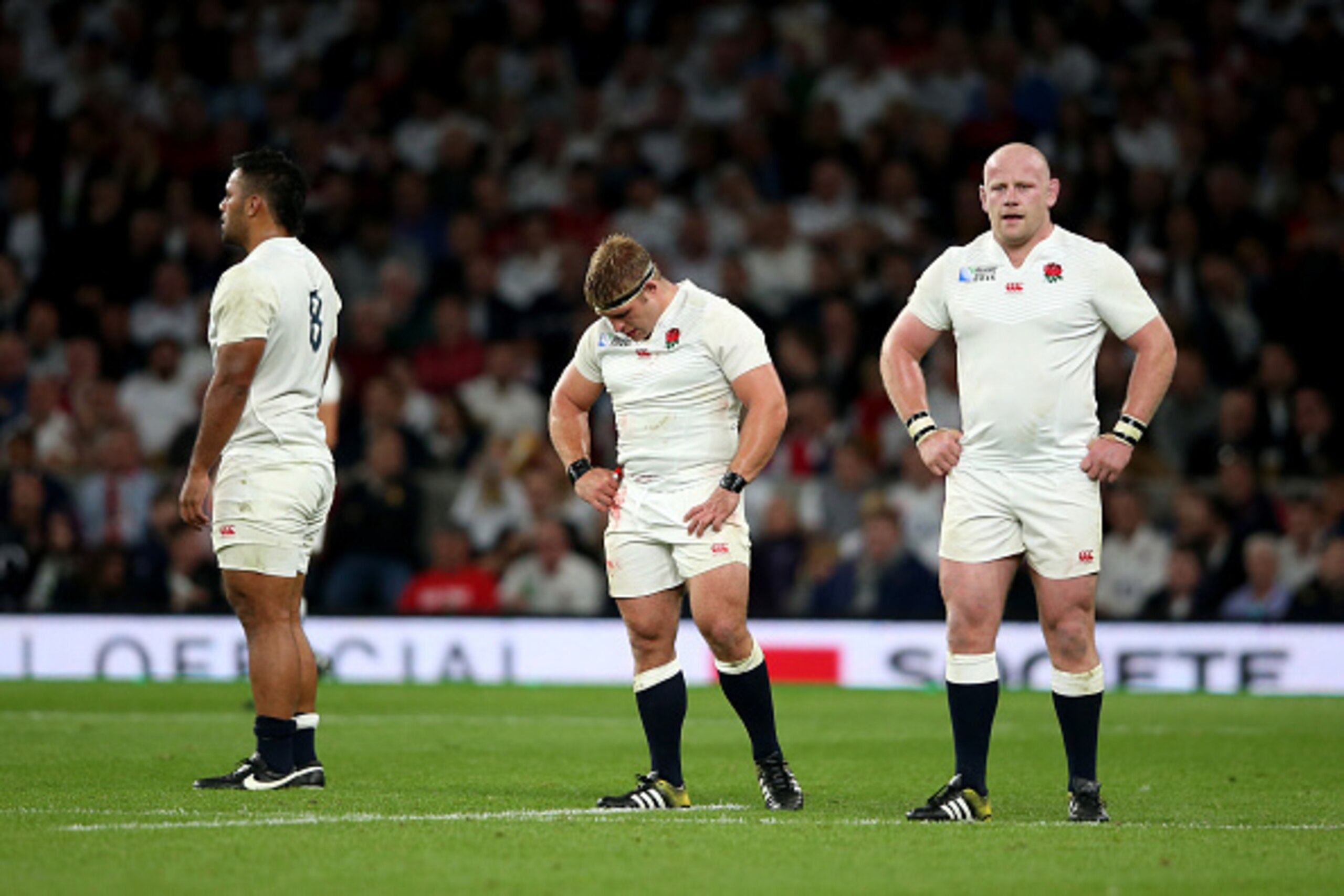 LONDON, ENGLAND - SEPTEMBER 26:  (L-R) Billy Vunipola, Tom Youngs and Dan Cole of England look dejected during the 2015 Rugby World Cup Pool A match between England and Wales at Twickenham Stadium on September 26, 2015 in London, United Kingdom.  (Photo b