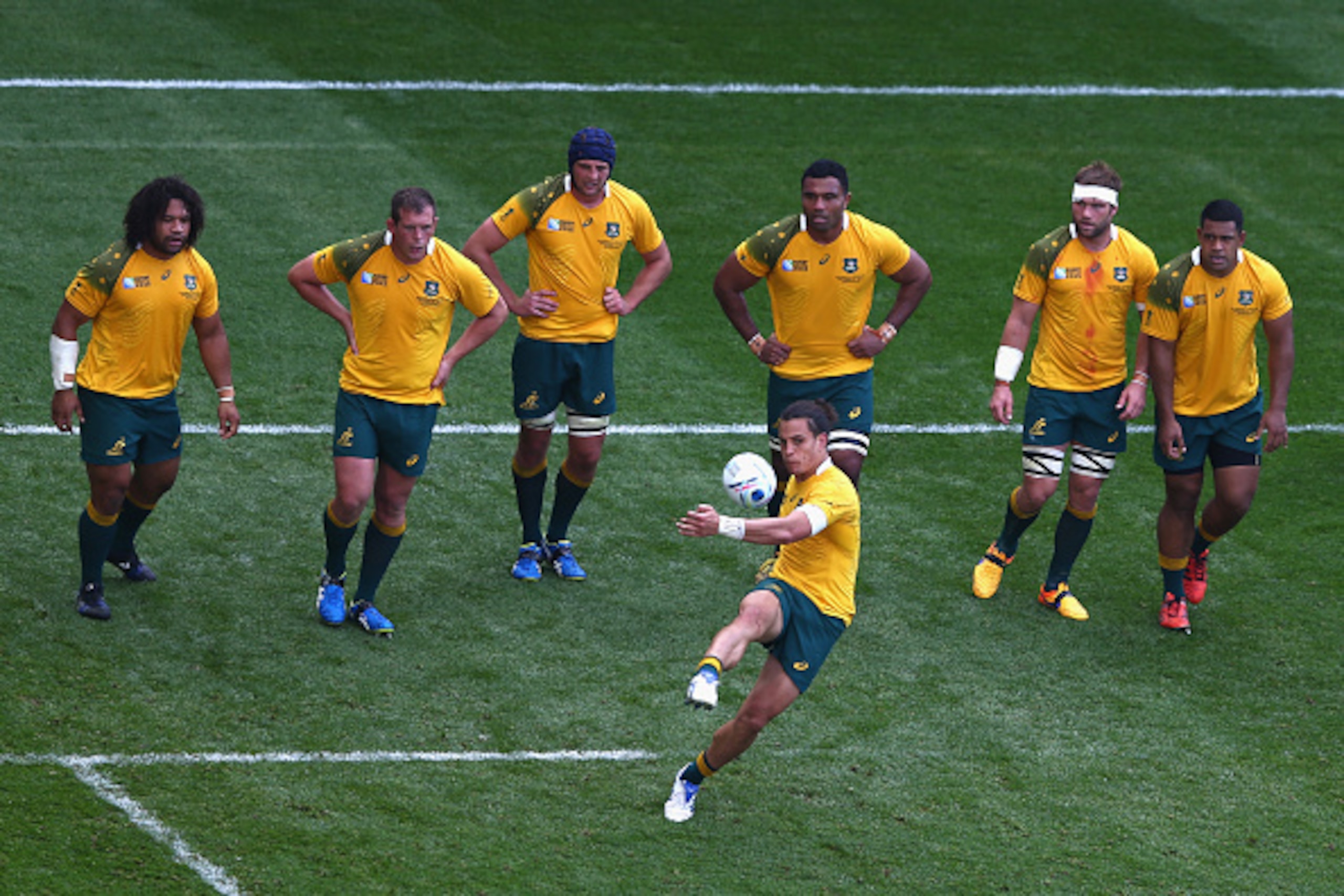 BIRMINGHAM, ENGLAND - SEPTEMBER 27:  Matt Toomua of Australia kicks for position during the 2015 Rugby World Cup Pool A match between Australia and Uruguay at Villa Park on September 27, 2015 in Birmingham, United Kingdom.  (Photo by Michael Steele/Getty 