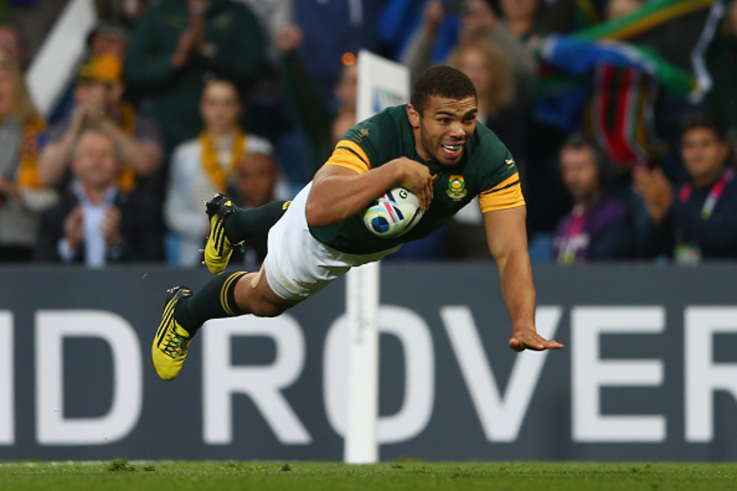 BIRMINGHAM, ENGLAND - SEPTEMBER 26: Bryan Habana of South Africa scores his sides sixth try during the 2015 Rugby World Cup Pool B match between South Africa and Samoa at Villa Park on September 26, 2015 in Birmingham, United Kingdom.  (Photo by Michael S