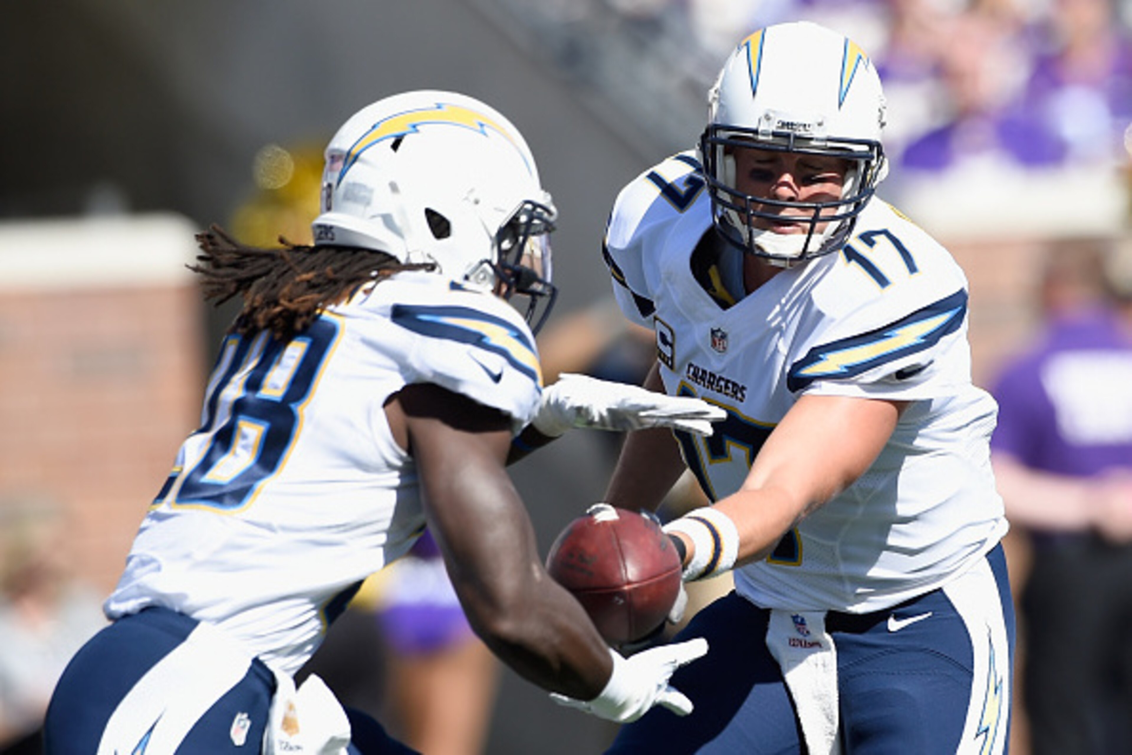MINNEAPOLIS, MN - SEPTEMBER 27: Philip Rivers #17 of the San Diego Chargers hands off the ball to teammate Melvin Gordon #28 against the Minnesota Vikings during the first quarter of the game on September 27, 2015 at TCF Bank Stadium in Minneapolis, Minne