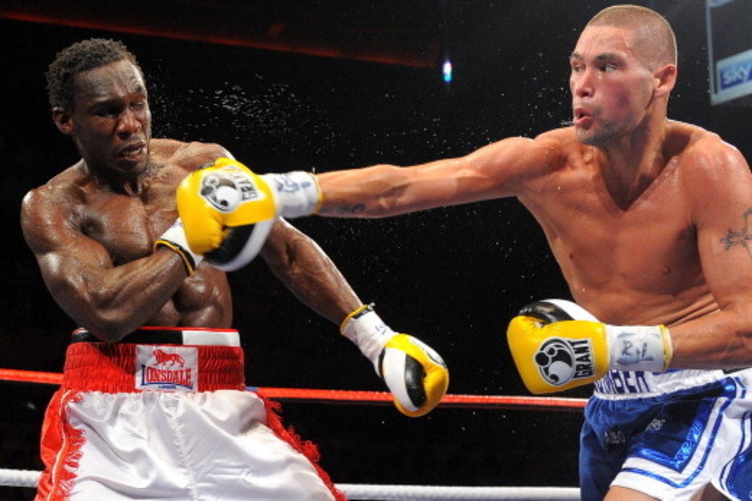 Tony Bellew (R) competes against Ovill McKenzie during their British light heavyweight championship boxing match at the Echo Arena in Liverpool, on July 16, 2011. AFP PHOTO/ ANDREW YATES (Photo credit should read ANDREW YATES/AFP/Getty Images)