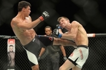 Jul 15, 2015; San Diego, CA, USA; Matt Dwyer (blue) fights Alan Jouban (red) during UFC Fight Night at Valley View Casino Center. Mandatory Credit: Jake Roth-USA TODAY Sports