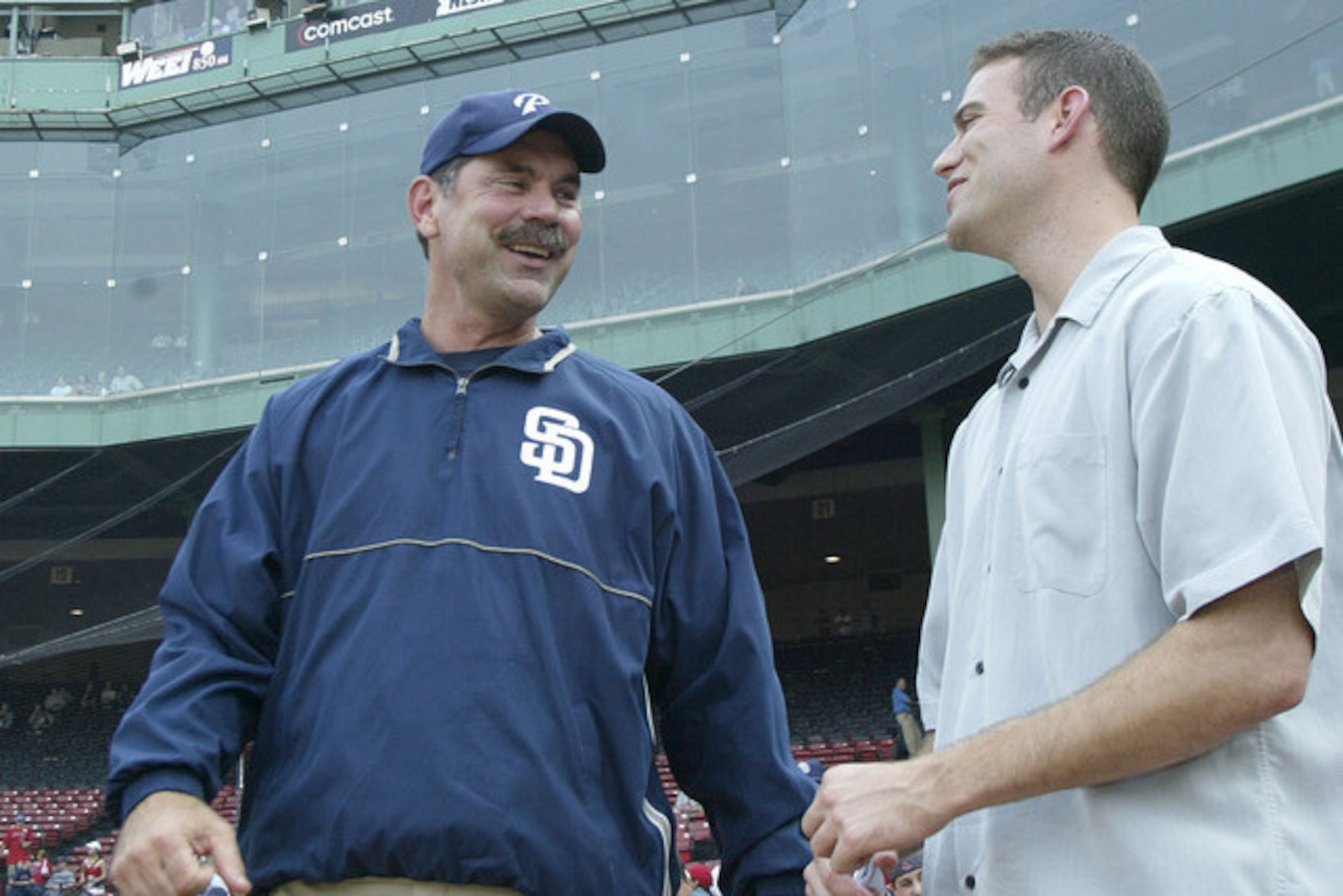 Former Padres manager Bruce Bochy catches up with Epstein in Boston. Former Padres manager Bruce Bochy catches up with Epstein in Boston.