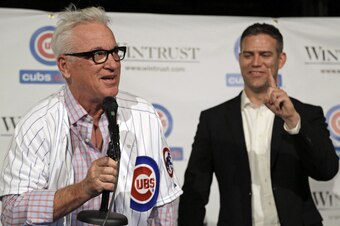 Maddon introduces himself to the Chicago media alongside Epstein.