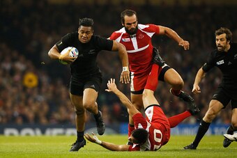 CARDIFF, WALES - OCTOBER 02:  Julian Savea of the New Zealand All Blacks breaks through Tamaz Mchedlidze and Tamaz Mchedlidze of Georgia  during the 2015 Rugby World Cup Pool C match between New Zealand and Georgia at the Millennium Stadium on October 2, 