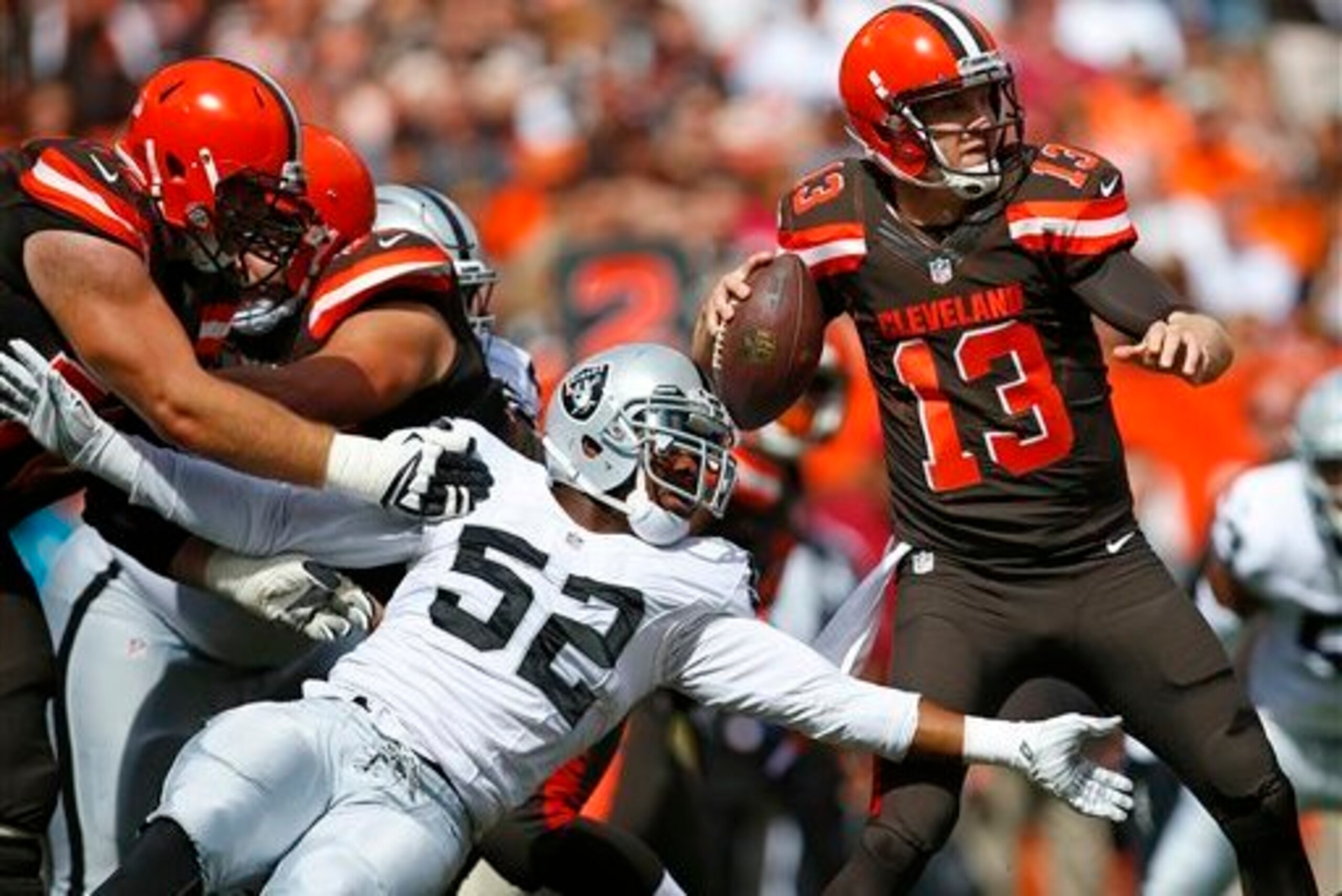 No. 52 Khalil Mack pressuring Browns quarterback Josh McCown in the pocket No. 52 Khalil Mack pressuring Browns quarterback Josh McCown in the pocket