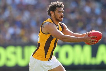 MELBOURNE, AUSTRALIA - OCTOBER 03: Cyril Rioli of the Hawks kicks during the 2015 AFL Grand Final match between the Hawthorn Hawks and the West Coast Eagles at Melbourne Cricket Ground on October 3, 2015 in Melbourne, Australia.  (Photo by Quinn Rooney/Ge