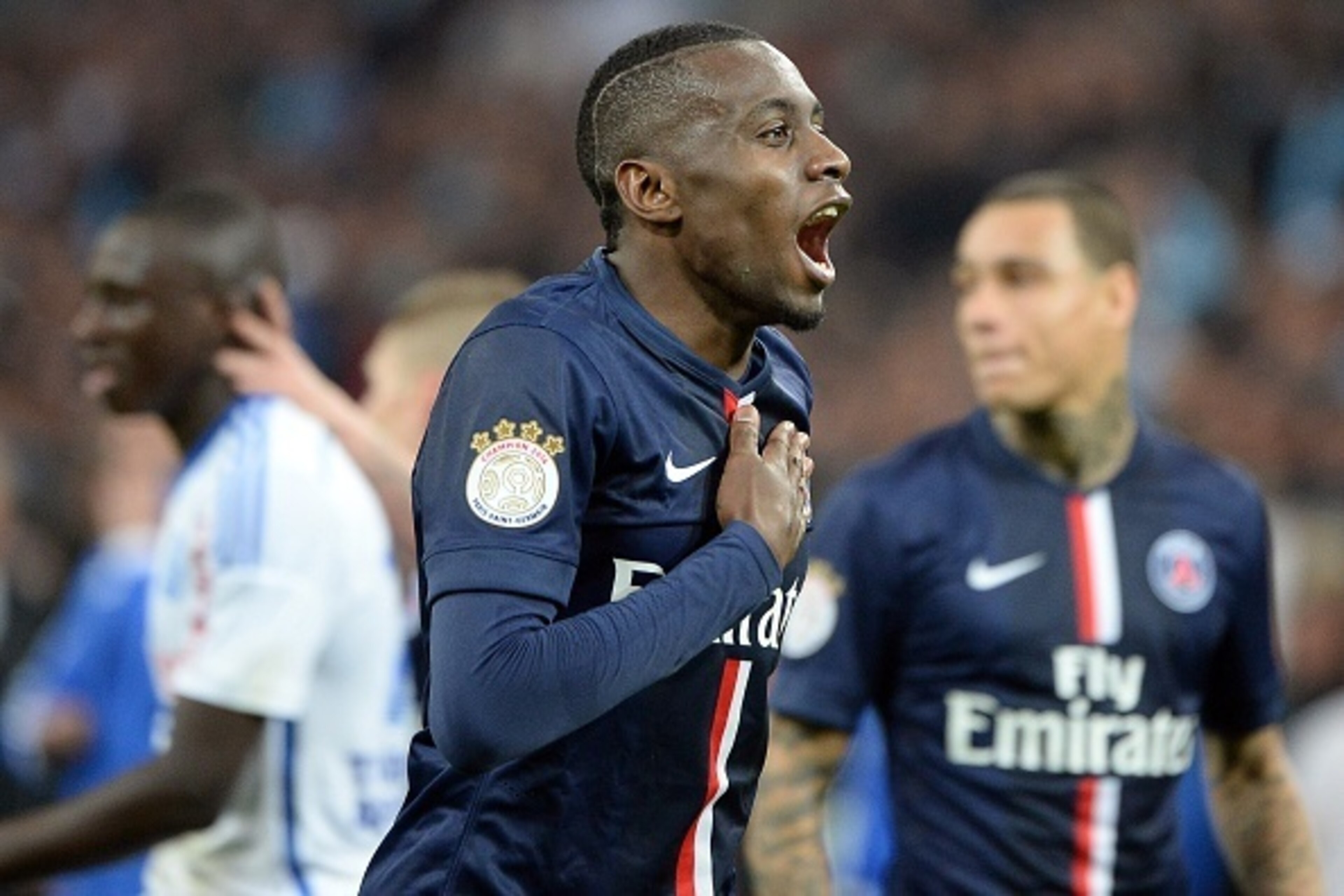 Paris Saint-Germain's French midfielder Blaise Matuidi jubilates at the end of the French L1 football match between Marseille (OM) and Paris (PSG) on April 5, 2015 at the Velodrome stadium in Marseille, southern France. AFP PHOTO / BORIS HORVAT        (Ph