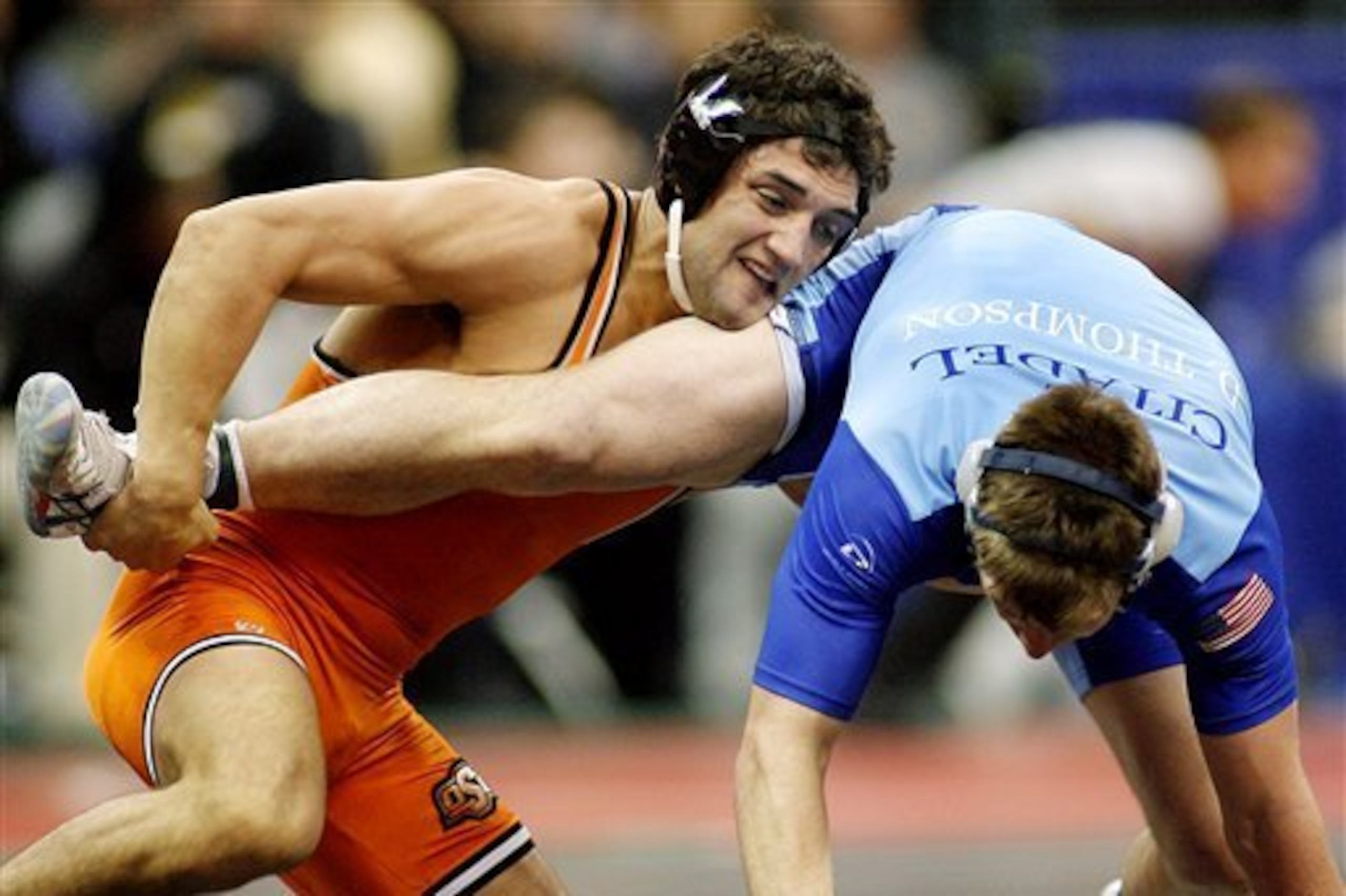 Hendricks (left) in his college wrestling days.