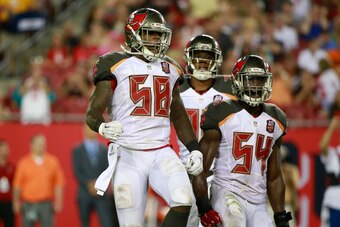 Aug 29, 2015; Tampa, FL, USA; Tampa Bay Buccaneers outside linebacker Kwon Alexander (58) and teammates react after Alexander makes a sack against the Cleveland Browns during the second quarter at Raymond James Stadium. Mandatory Credit: Kim Klement-USA T