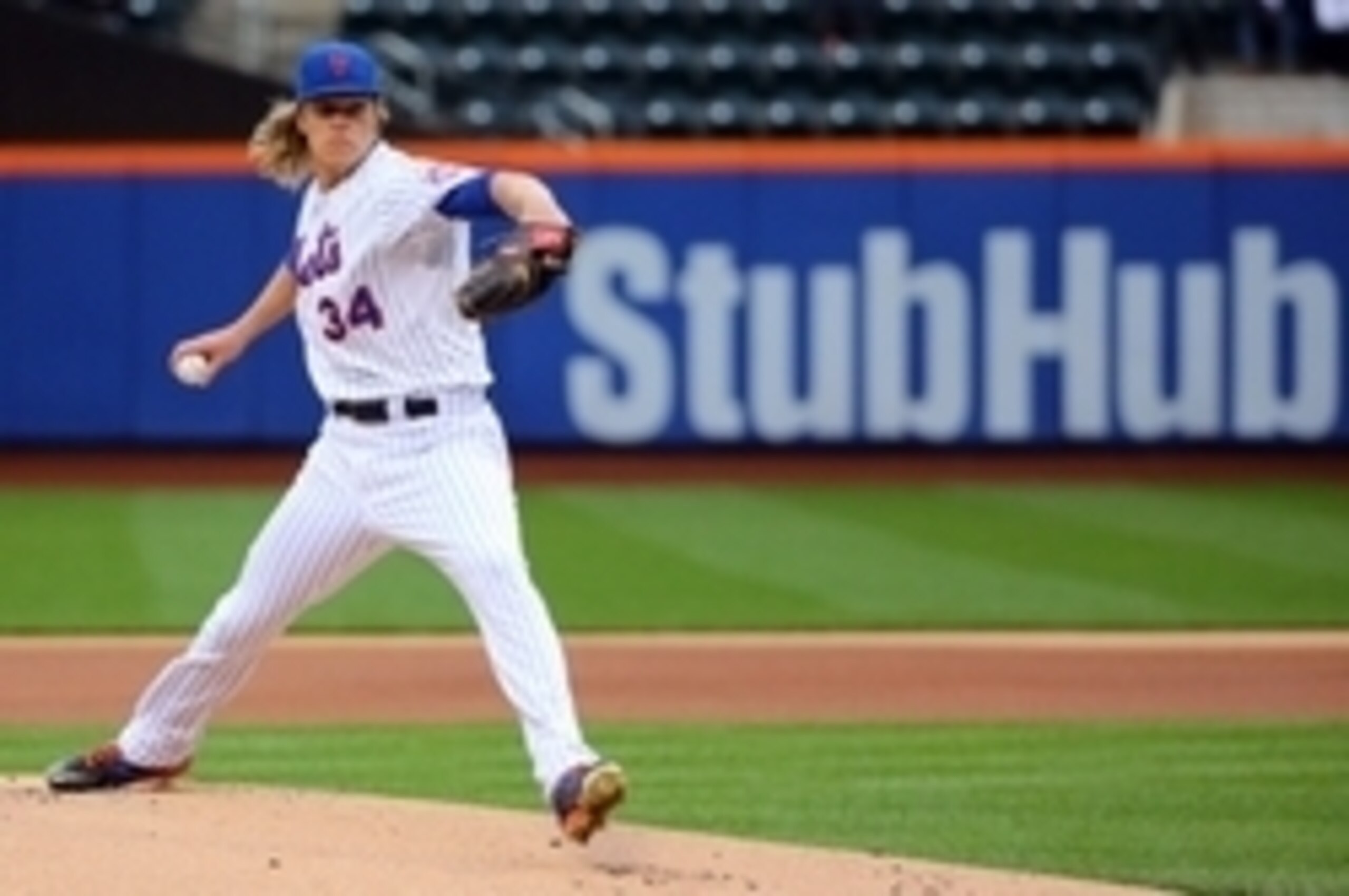 Oct 3, 2015; New York City, NY, USA;  New York Mets starting pitcher Noah Syndergaard (34) pitches during the first inning against the Washington Nationals at Citi Field. Mandatory Credit: Anthony Gruppuso-USA TODAY Sports