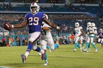 MIAMI GARDENS, FL - SEPTEMBER 27:  Karlos Williams #29 of the Buffalo Bills scores a touchdown during a game against the Miami Dolphins at Sun Life Stadium on September 27, 2015 in Miami Gardens, Florida.  (Photo by Mike Ehrmann/Getty Images)
