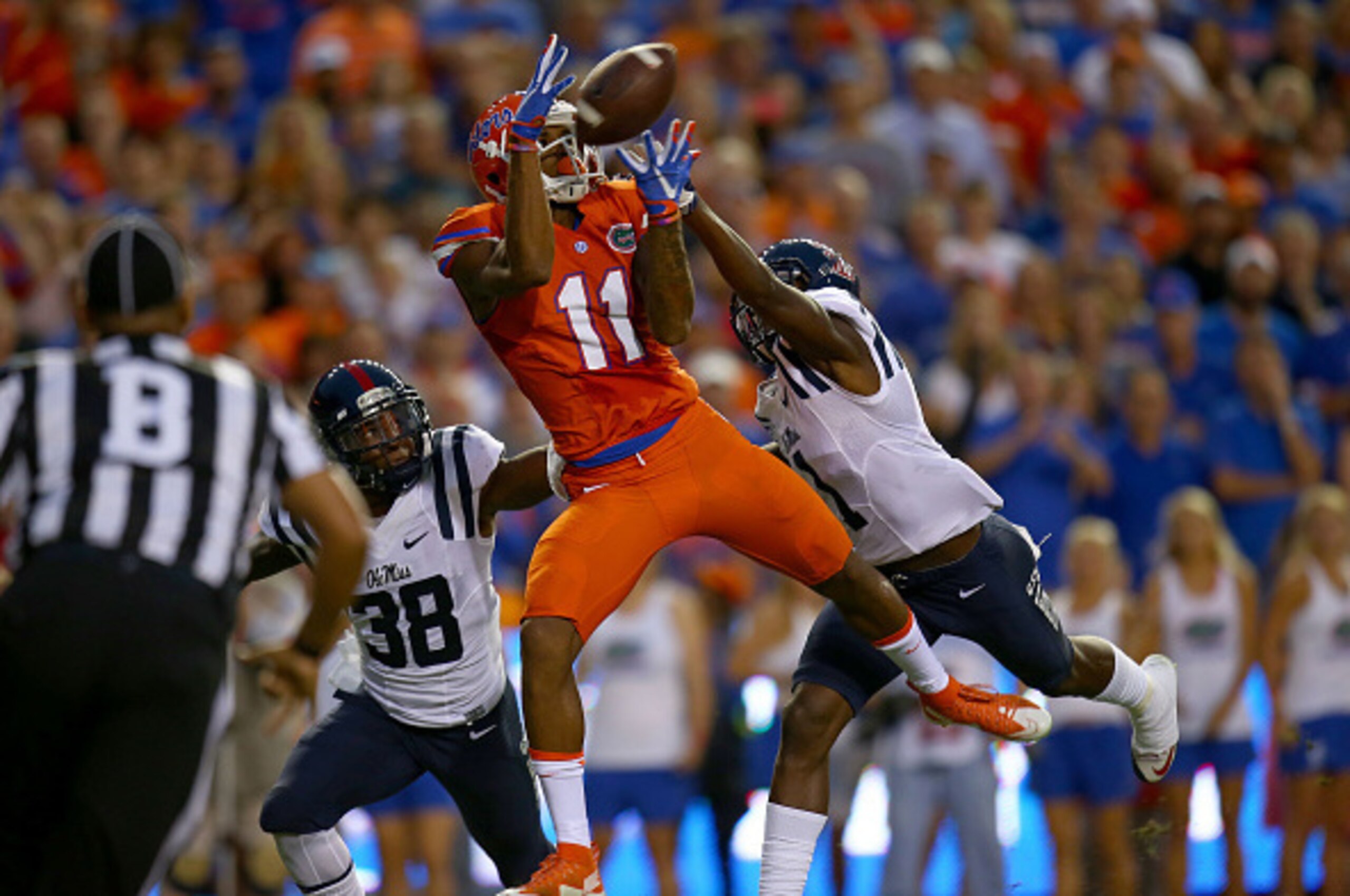 GAINESVILLE, FL - OCTOBER 03: Demarcus Robinson #11 of the Florida Gators catches a touchdown pass during the first quarter of the game against the Mississippi Rebels on October 3, 2015 in Gainesville, Florida.  (Photo by Rob Foldy/Getty Images)