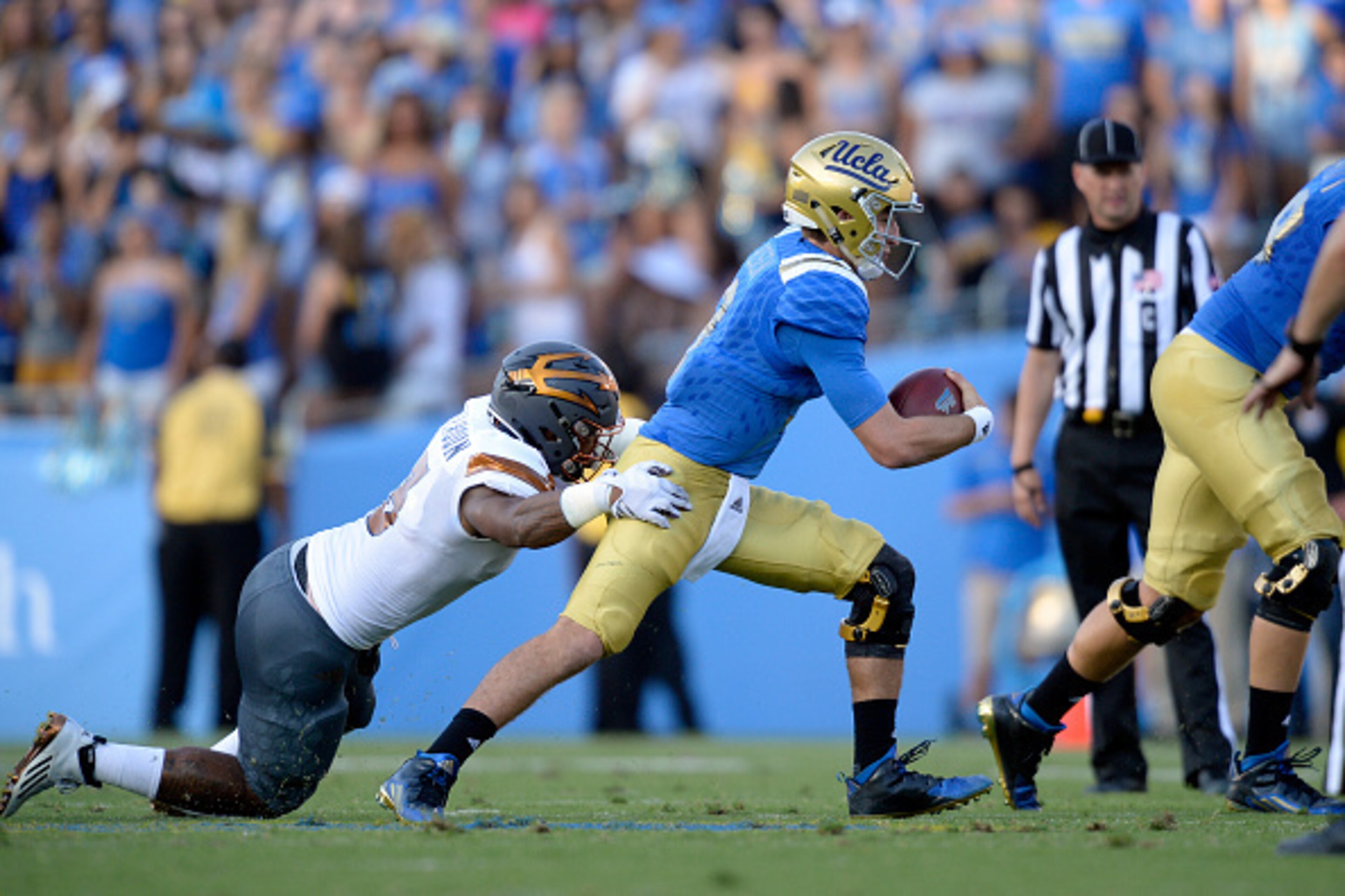 PASADENA, CA - OCTOBER 3: Quarterback Josh Rosen #3 of the UCLA Bruins is sacked by linebacker Christian Sam #2 of the Arizona State Sun Devils during the second quarter of the college football game at the Rose Bowl October 3, 2015, in Pasadena, Californi