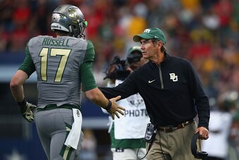 ARLINGTON, TX - OCTOBER 03:  Seth Russell #17 of the Baylor Bears celebrates his touchdown with Art Briles in the second quarter against the Texas Tech Red Raiders at AT&T Stadium on October 3, 2015 in Arlington, Texas.  (Photo by Ronald Martinez/Getty Im