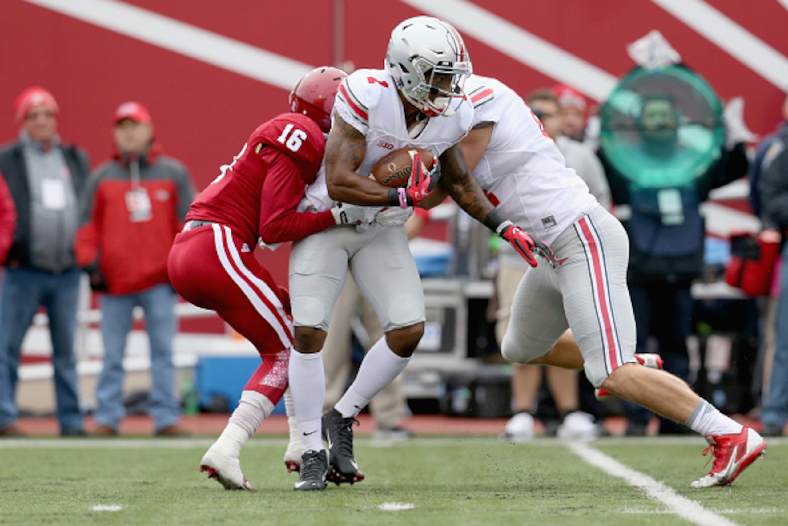 BLOOMINGTON, IN - OCTOBER 03:  Braxton Miler #1 of the Ohio State Buckeyes ais tackled by Rashard Fant #16 of the Indiana Hoosiers at Memorial Stadium on October 3, 2015 in Bloomington, Indiana.  (Photo by Andy Lyons/Getty Images)
