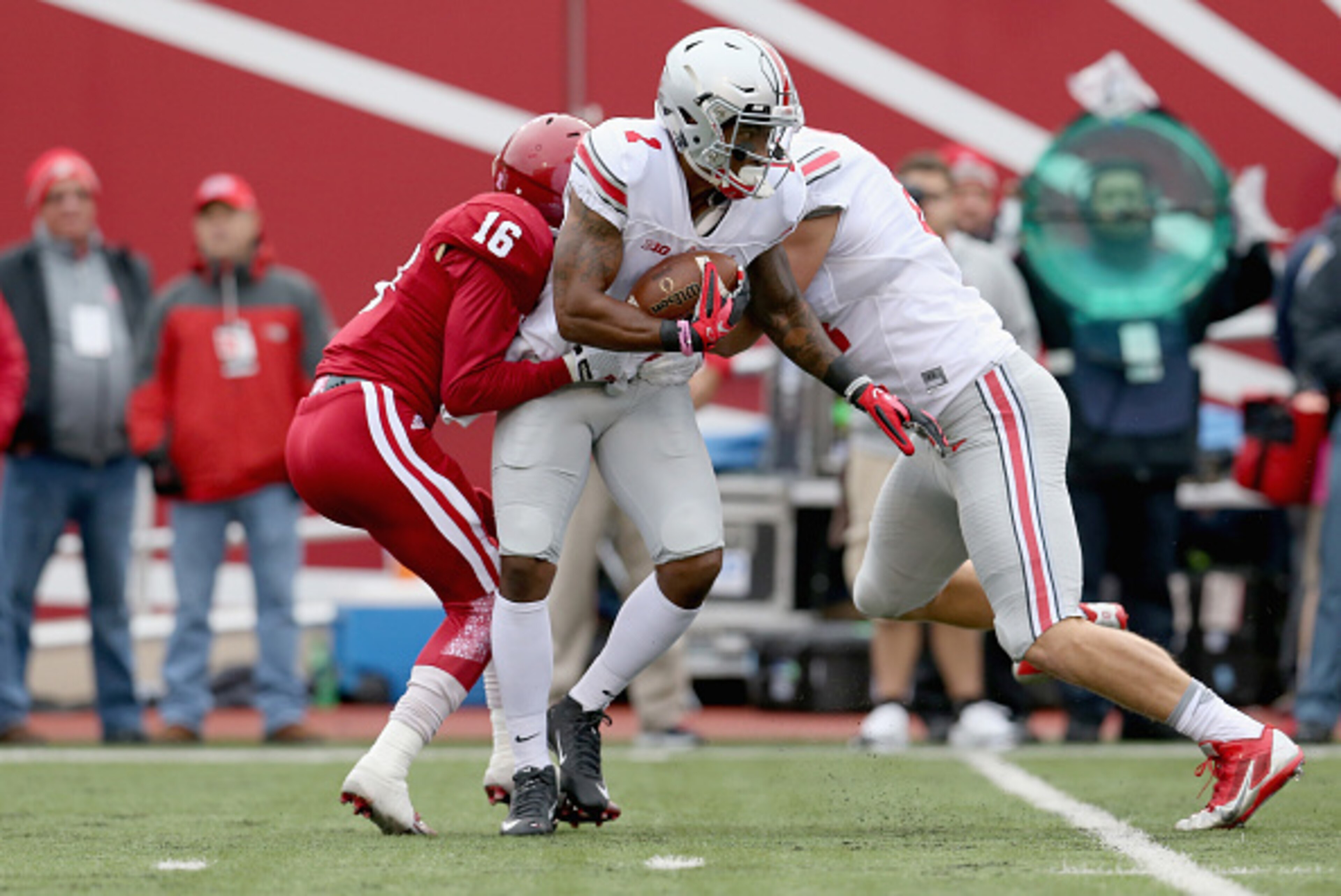 BLOOMINGTON, IN - OCTOBER 03:  Braxton Miler #1 of the Ohio State Buckeyes ais tackled by Rashard Fant #16 of the Indiana Hoosiers at Memorial Stadium on October 3, 2015 in Bloomington, Indiana.  (Photo by Andy Lyons/Getty Images)