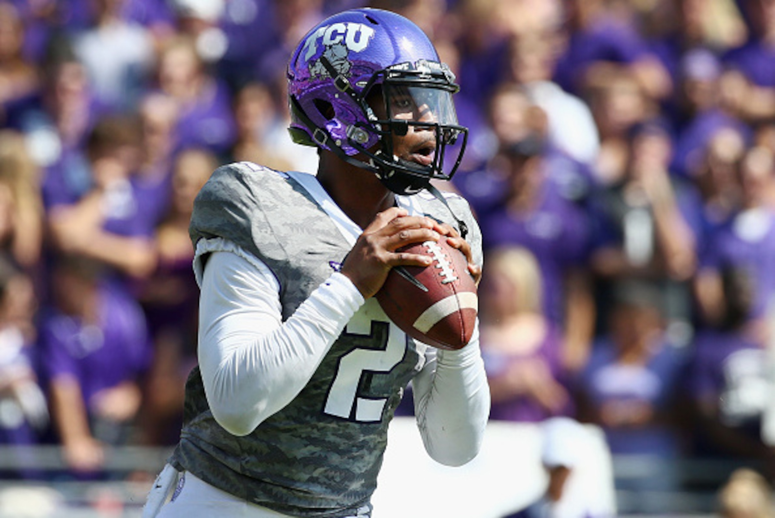 FORT WORTH, TX - OCTOBER 03:  Trevone Boykin #2 of the TCU Horned Frogs looks for an open receiver against the Texas Longhorns in the second quarter at Amon G. Carter Stadium on October 3, 2015 in Fort Worth, Texas.  (Photo by Tom Pennington/Getty Images)