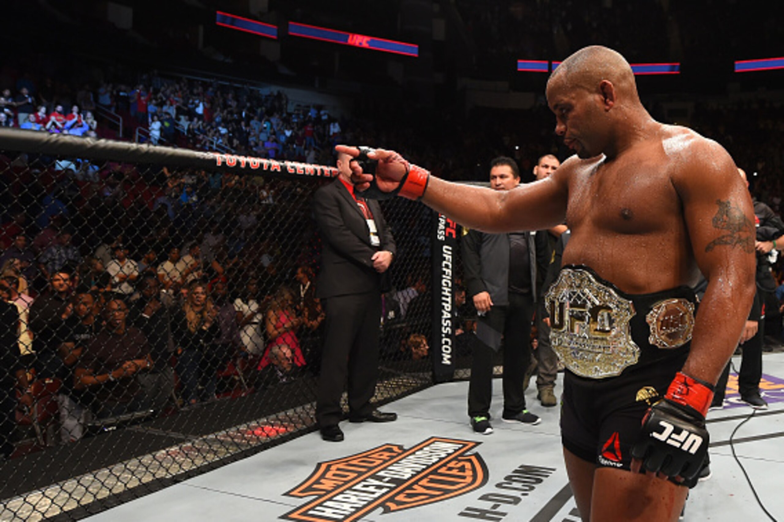 HOUSTON, TX - OCTOBER 03:  Daniel Cormier celebrates his victory over Alexander Gustafsson in their UFC light heavyweight championship bout during the UFC 192 event at the Toyota Center on October 3, 2015 in Houston, Texas. (Photo by Josh Hedges/Zuffa LLC