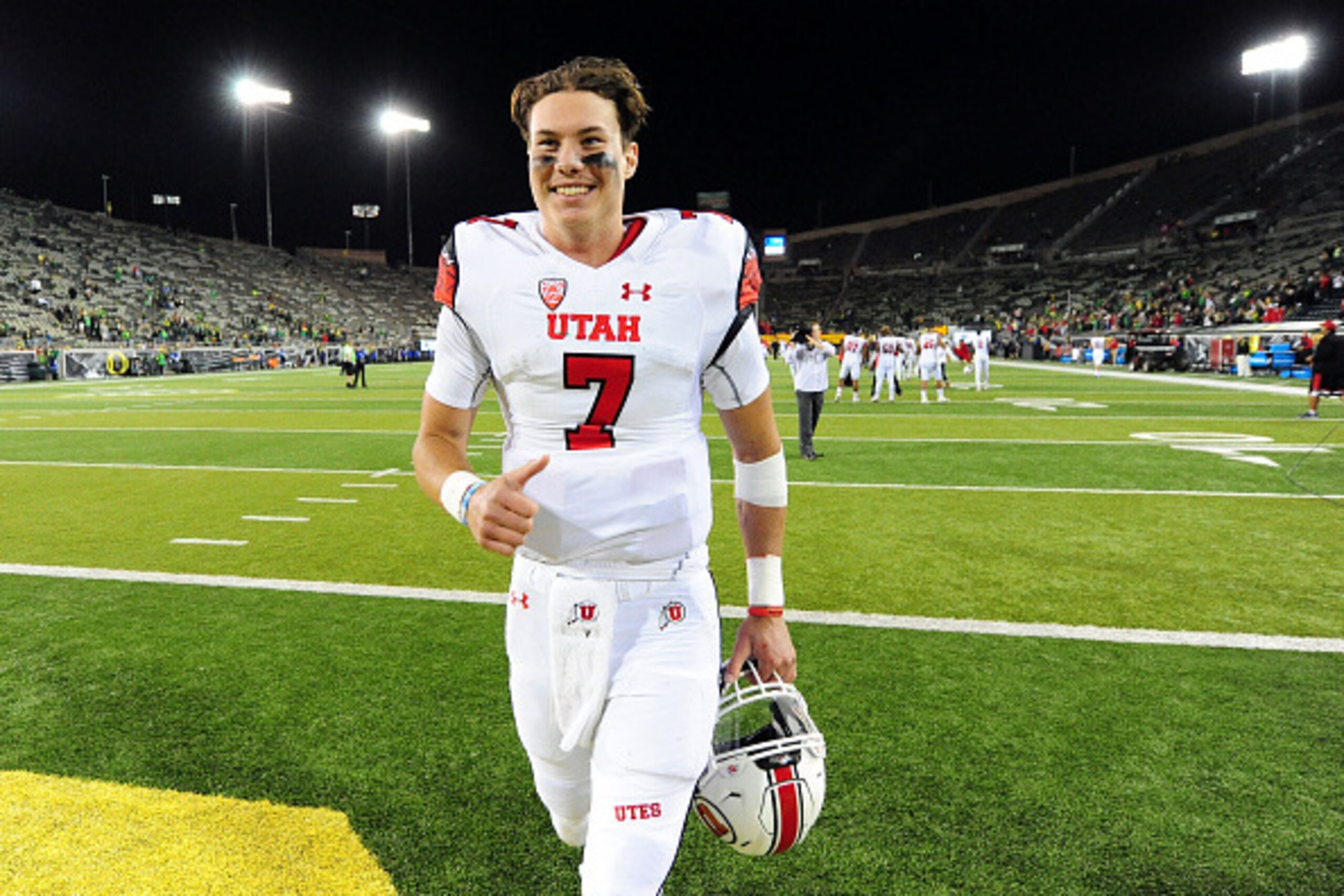 EUGENE, OR - SEPTEMBER 26:  Quarterback Travis Wilson #7 of the Utah Utes runs off the field after the Utah Utes beat the Oregon Ducks 62-20 at Autzen Stadium on September 26, 2015 in Eugene, Oregon.  (Photo by Steve Dykes/Getty Images)
