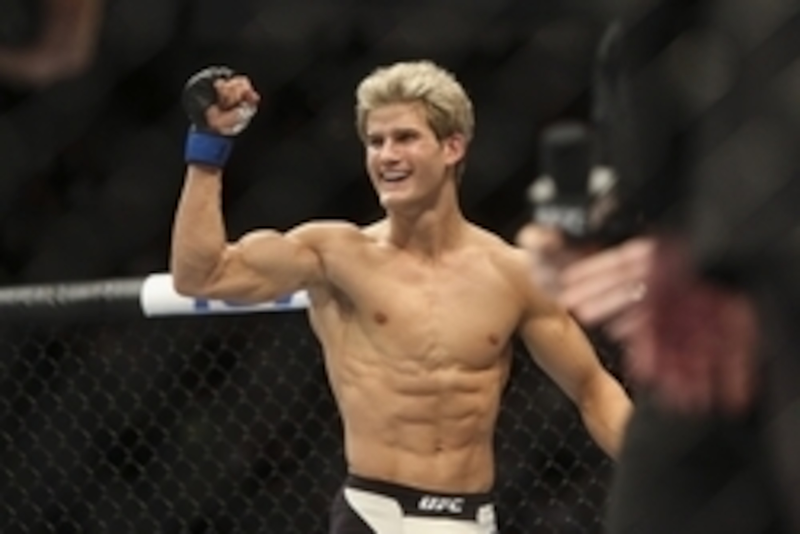 Oct 3, 2015; Houston, TX, USA; Sage Northcutt (blue gloves) celebrates after defeating Francisco Trevino (not pictured) during UFC 192 at Toyota Center. Mandatory Credit: Troy Taormina-USA TODAY Sports