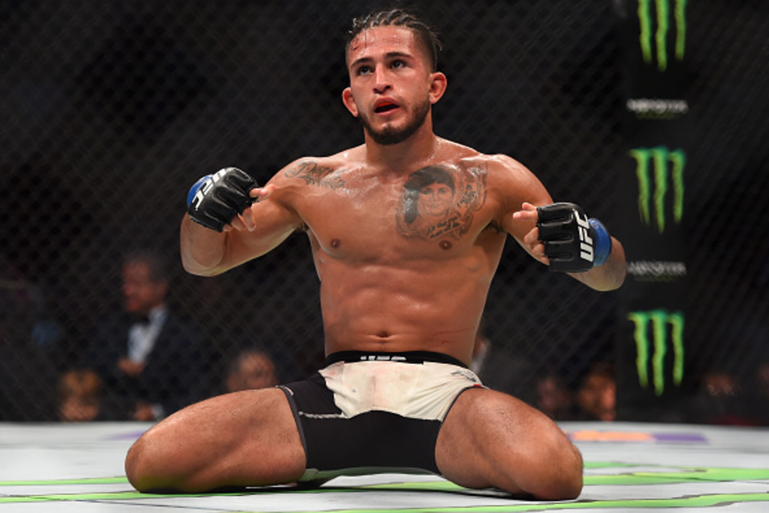 HOUSTON, TX - OCTOBER 03:  Sergio Pettis celebrates after defeating Chris Cariaso in their flyweight bout during the UFC 192 event at the Toyota Center on October 3, 2015 in Houston, Texas. (Photo by Jeff Bottari/Zuffa LLC/Zuffa LLC via Getty Images)