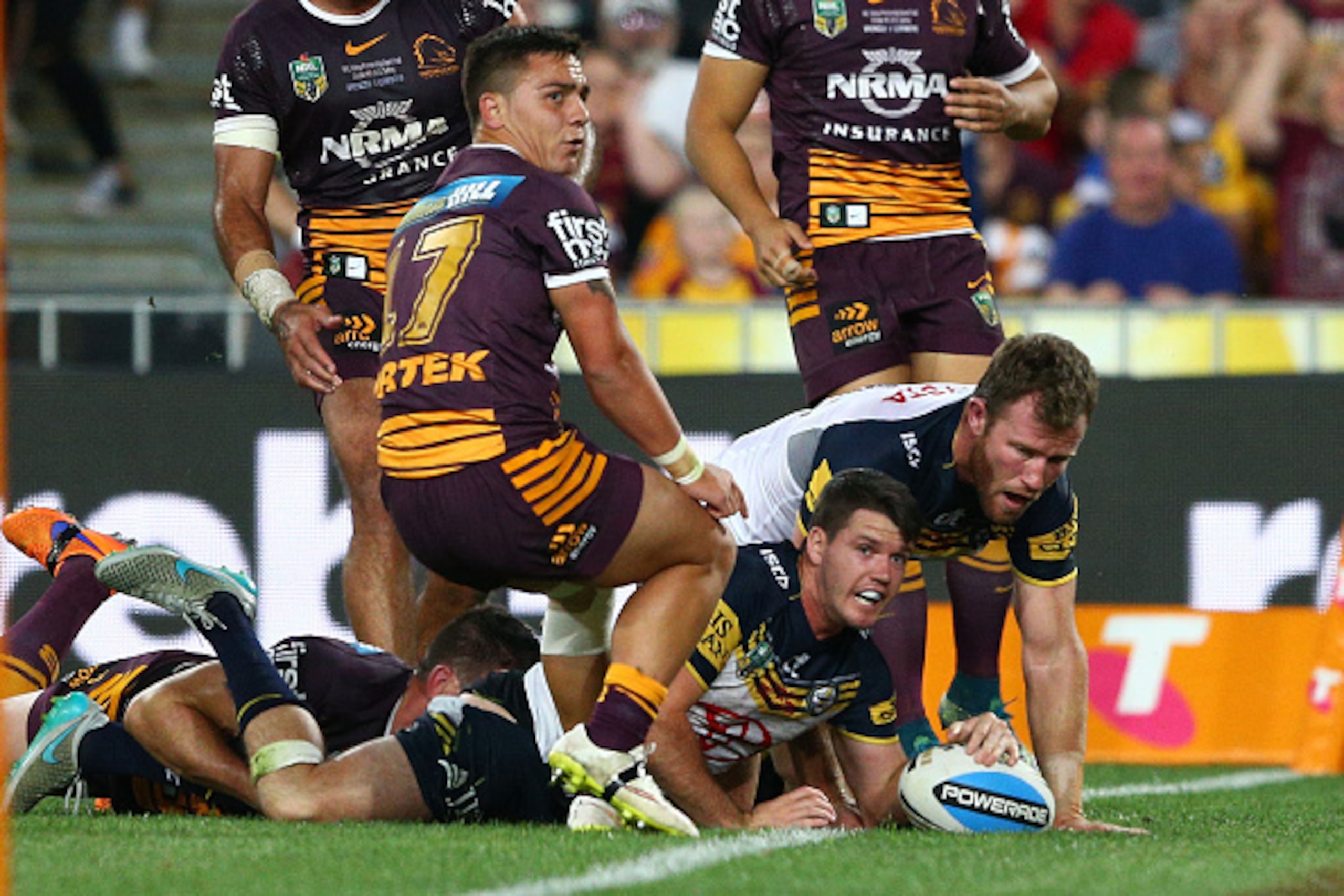 SYDNEY, AUSTRALIA - OCTOBER 04:  Lachlan Coote of the Cowboys scores a try which was disallowed during the 2015 NRL Grand Final match between the Brisbane Broncos and the North Queensland Cowboys at ANZ Stadium on October 4, 2015 in Sydney, Australia.  (P