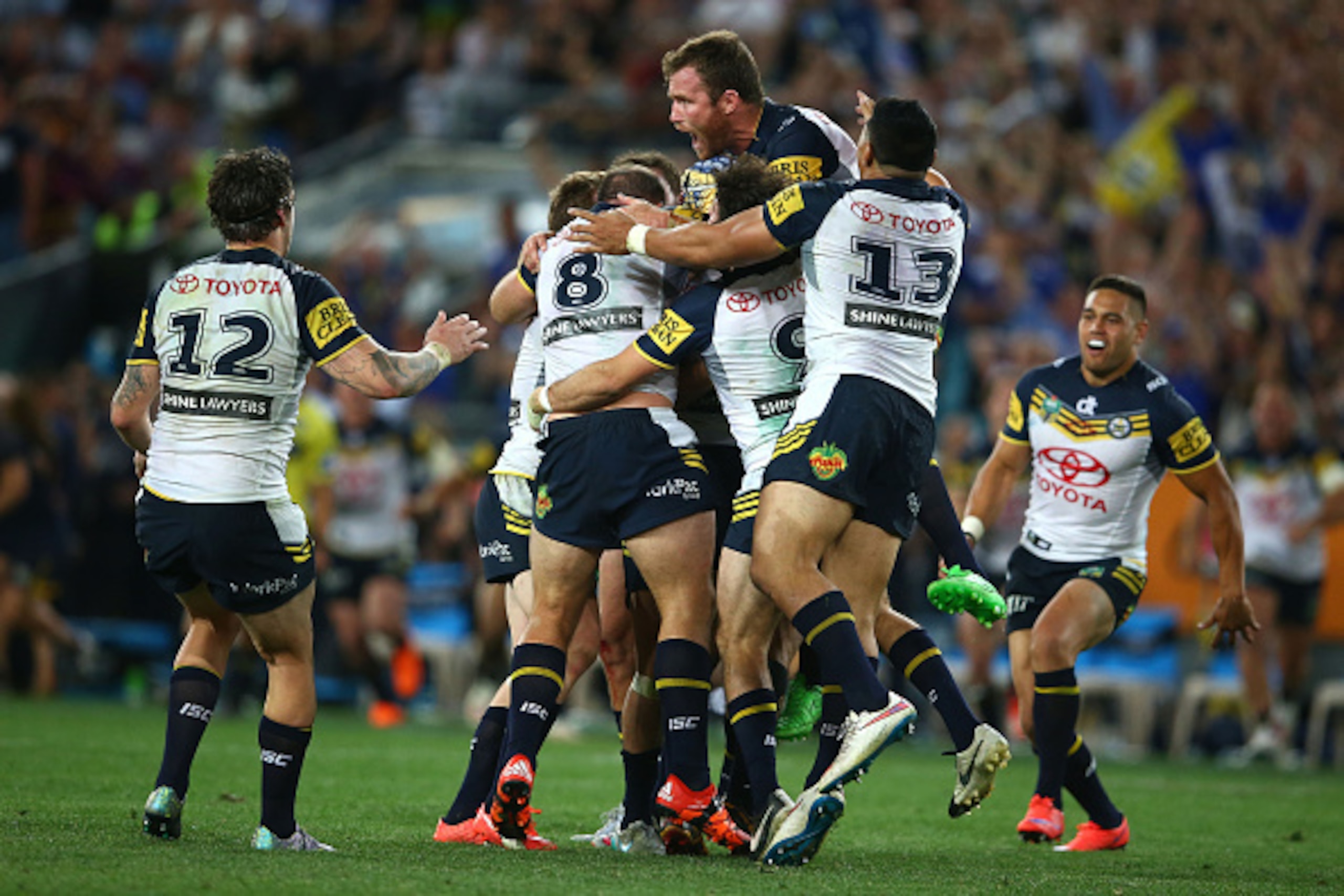 SYDNEY, AUSTRALIA - OCTOBER 04:  The Cowboys celebrate winning the 2015 NRL Grand Final match between the Brisbane Broncos and the North Queensland Cowboys at ANZ Stadium on October 4, 2015 in Sydney, Australia.  (Photo by Mark Kolbe/Getty Images)