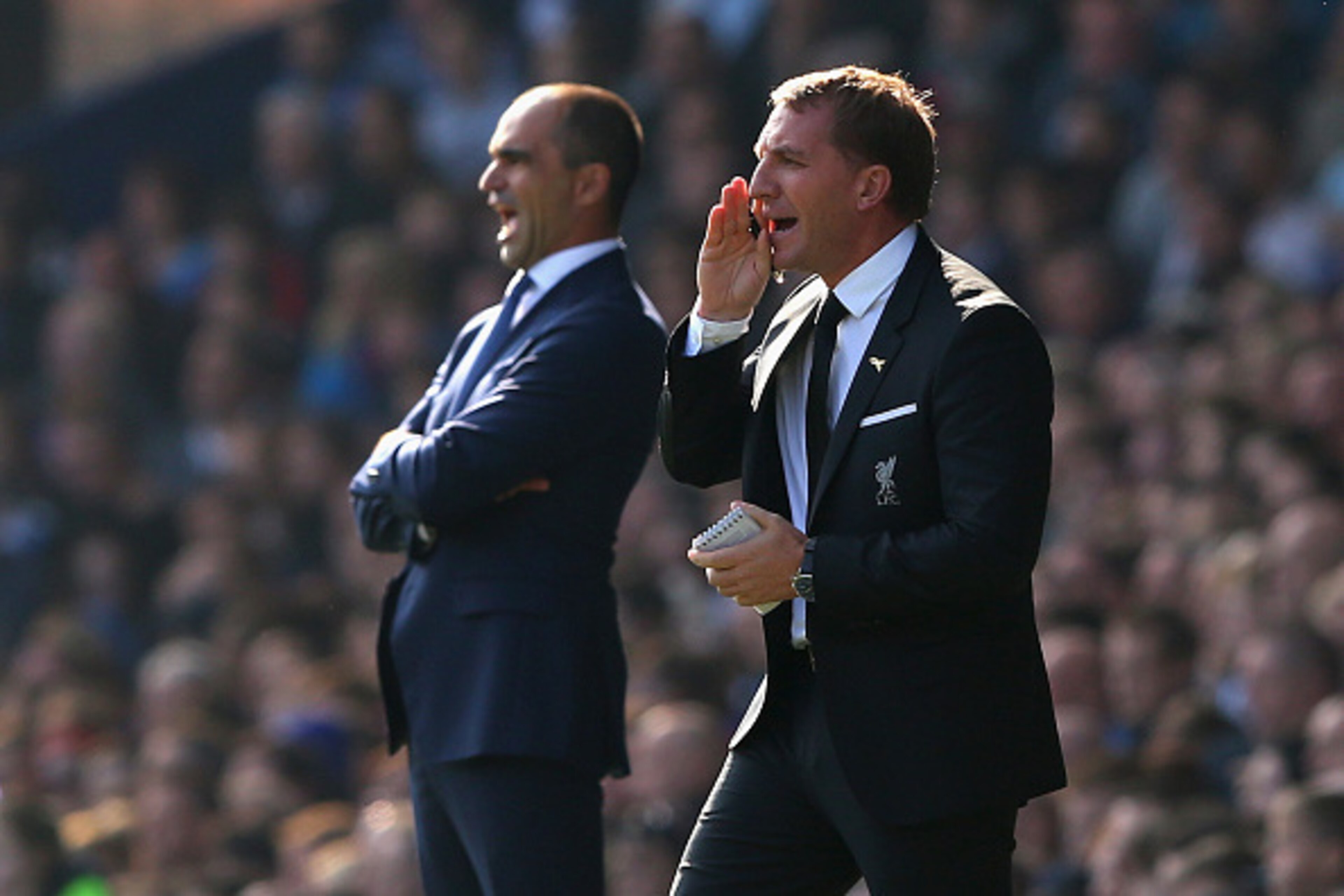 LIVERPOOL, ENGLAND - OCTOBER 04:  Roberto Martinez manager of Everton and Brendan Rodgers manager of Liverpool on the touchline during the Barclays Premier League match between Everton and Liverpool at Goodison Park on October 4, 2015 in Liverpool, Englan