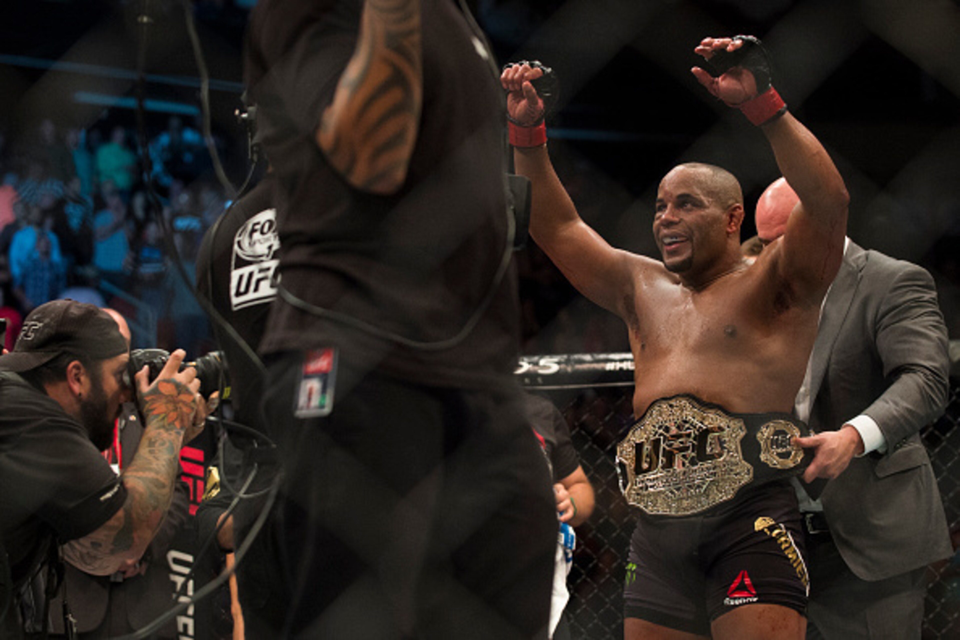 HOUSTON, TX - OCTOBER 3:  Daniel Cormier celebrates after defeating Alexander Gustafsson during UFC 192 at the Toyota Center on October 3, 2015 in Houston, Texas. (Photo by Cooper Neill/Zuffa LLC/Zuffa LLC via Getty Images)