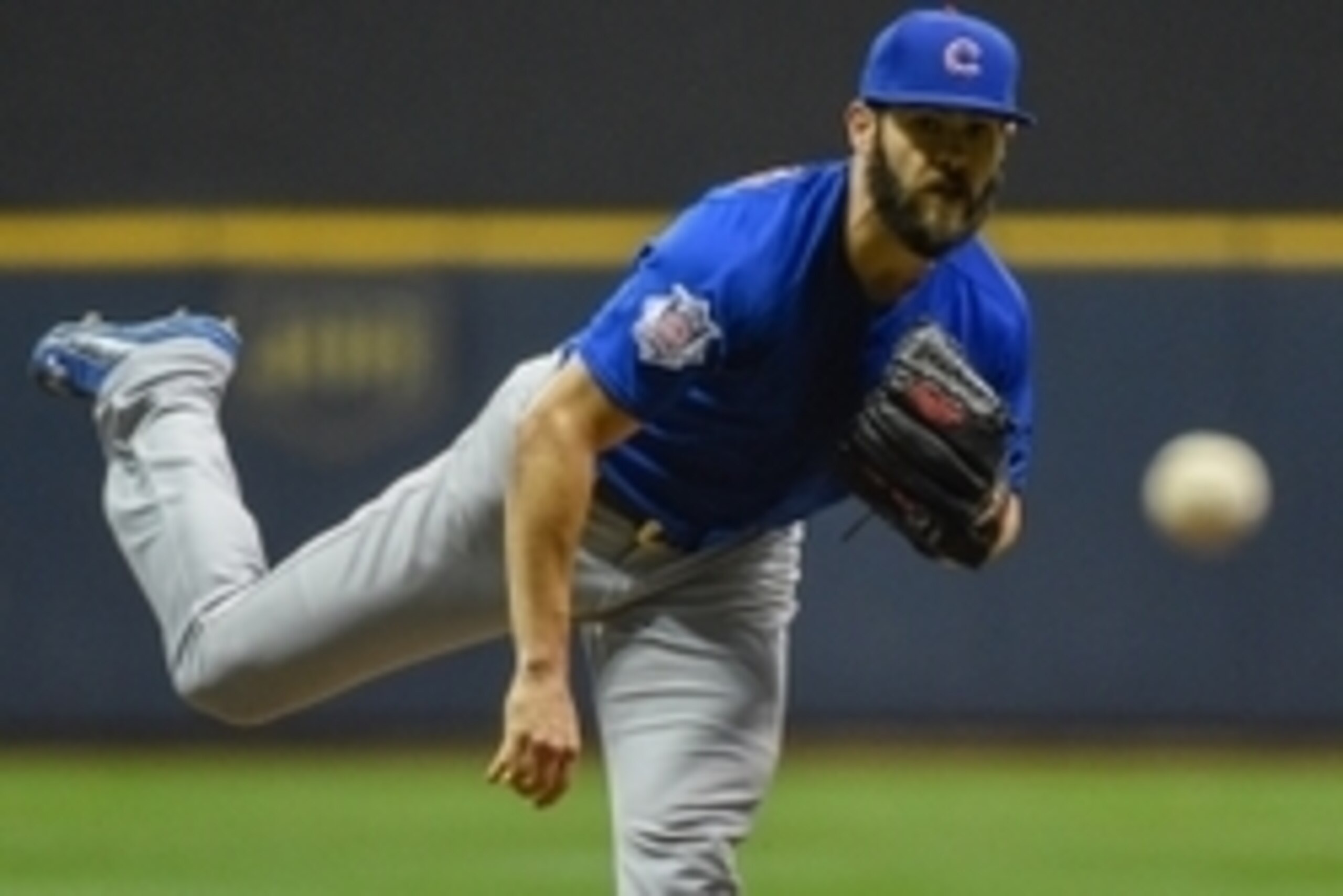 Oct 2, 2015; Milwaukee, WI, USA;  Chicago Cubs pitcher Jake Arrieta (49) pitches in the first inning against the Milwaukee Brewers at Miller Park. Mandatory Credit: Benny Sieu-USA TODAY Sports