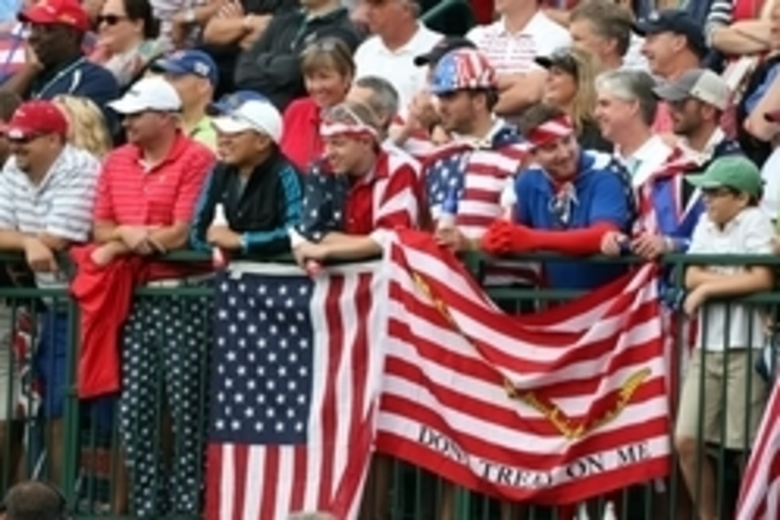 Oct 5, 2013; Dublin, OH, USA; USA fans on the 1st tee during the third round of the Presidents Cup at Muirfield Village Golf Club. Mandatory Credit: Brian Spurlock-USA TODAY Sports